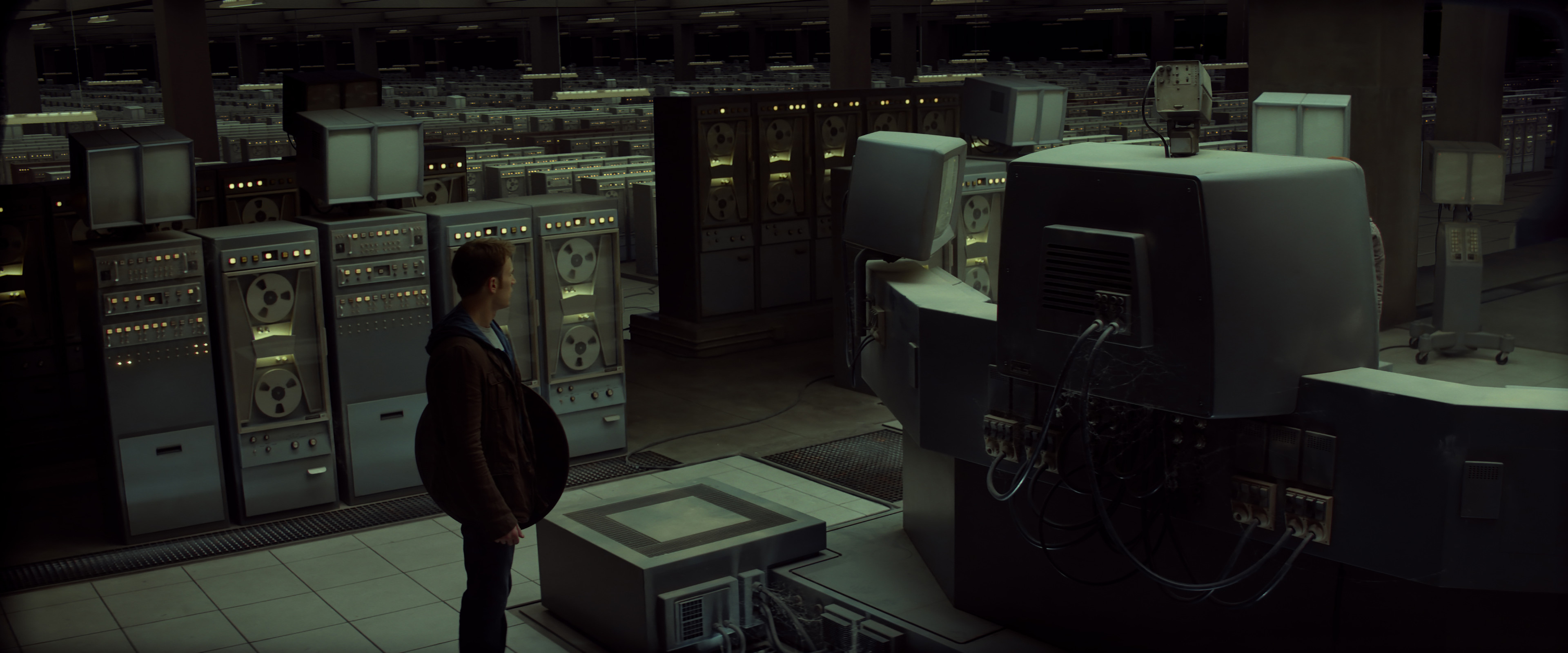 Extension of the live action plate (which includes characters and foreground) with never-ending rows of ancient computers, which form the digital brain of the deceased Doctor Zola.