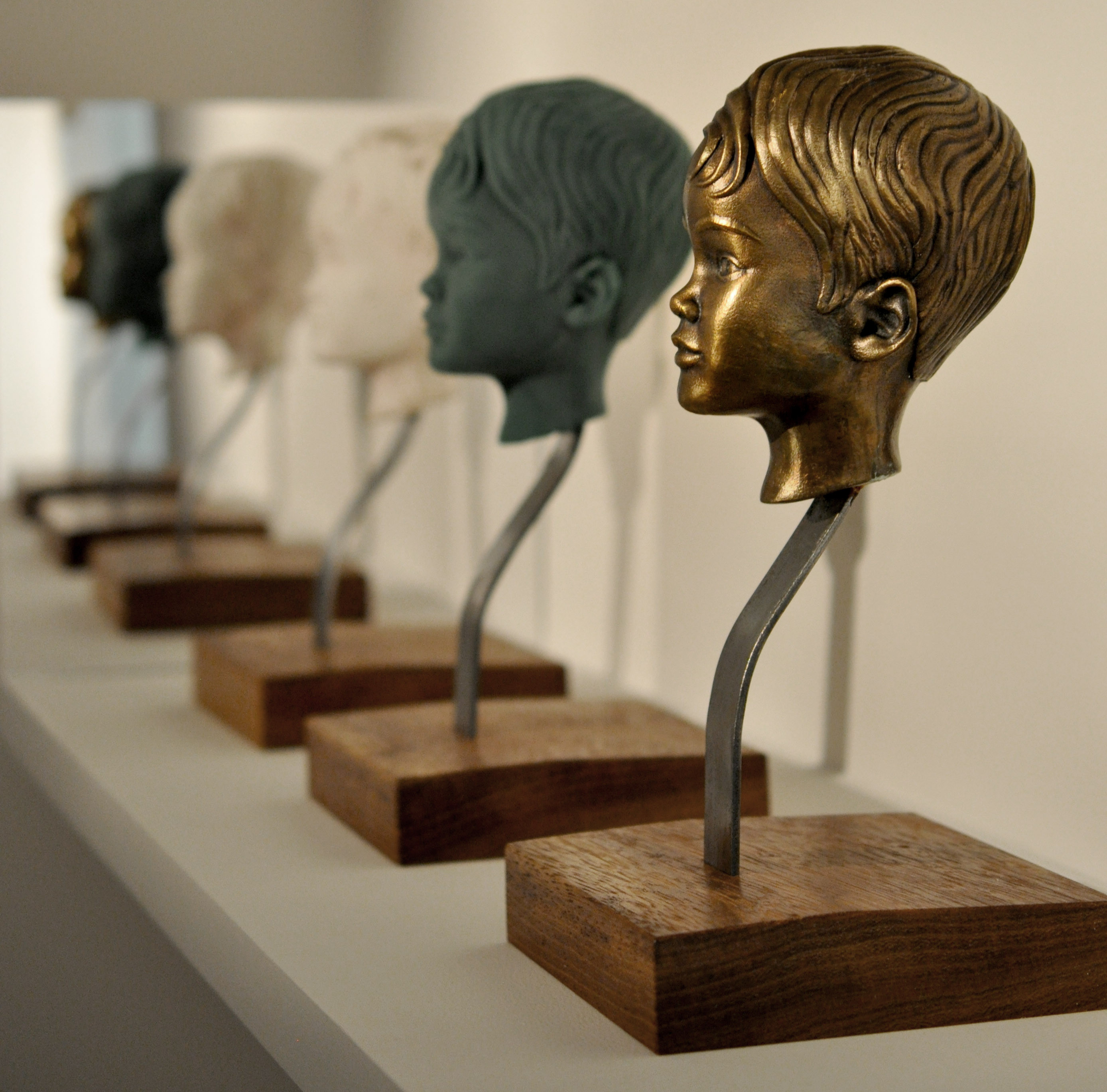 Bronze, wax and 3D printed variations of bust.