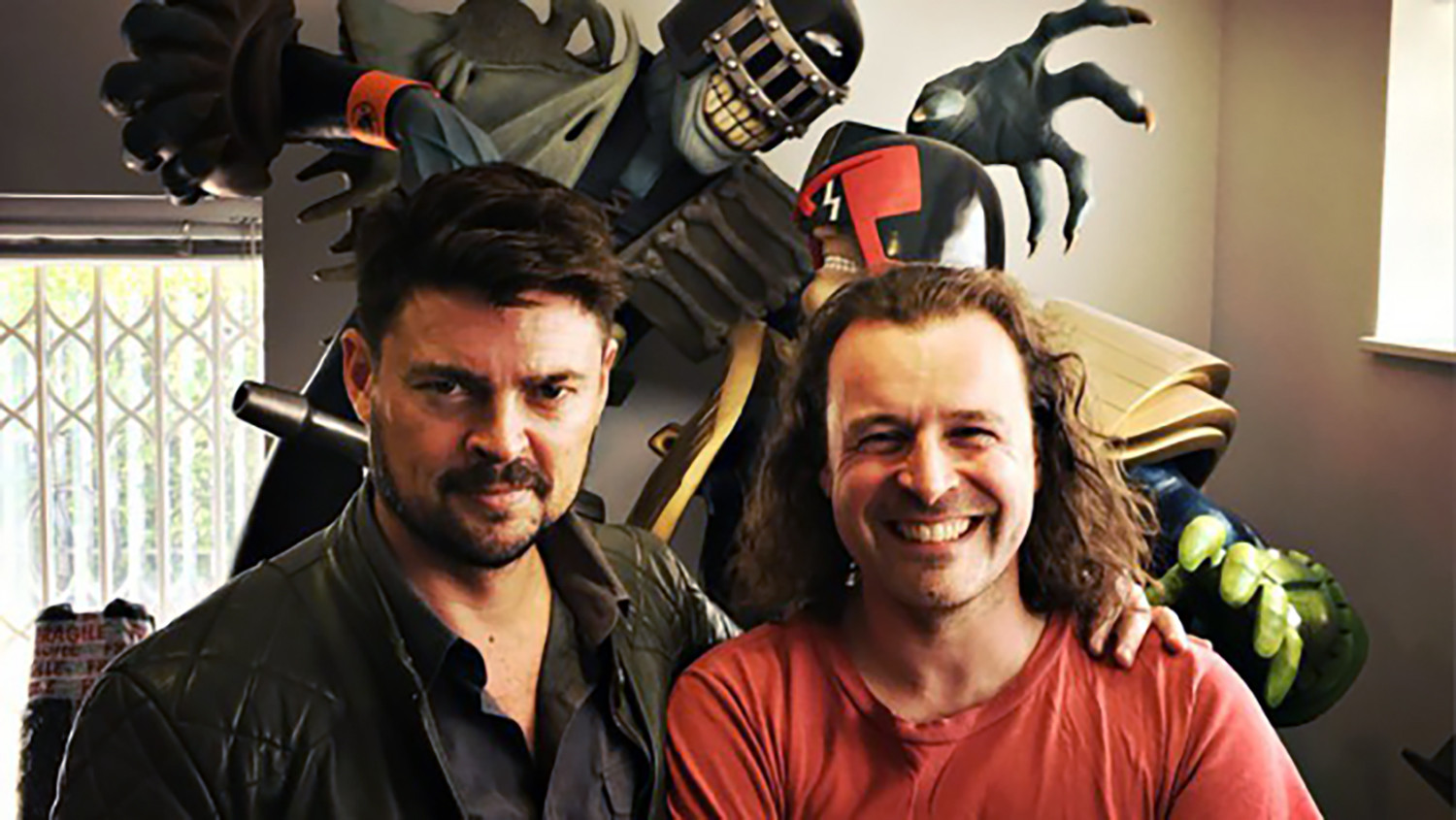 2000AD comic lobby with Karl Urban (Dredd) and Rebellion games owner Jason Kingsley