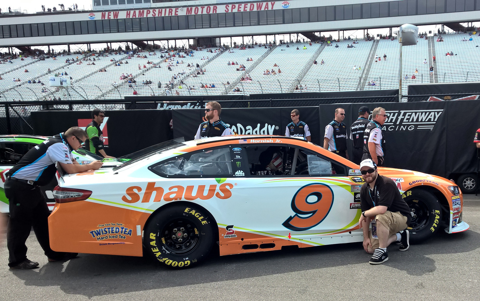 Posing with the #9 Shaw's Supermarkets Ford Fusion in the garage at New Hampshire Motor Speedway on July 17th, 2015.
