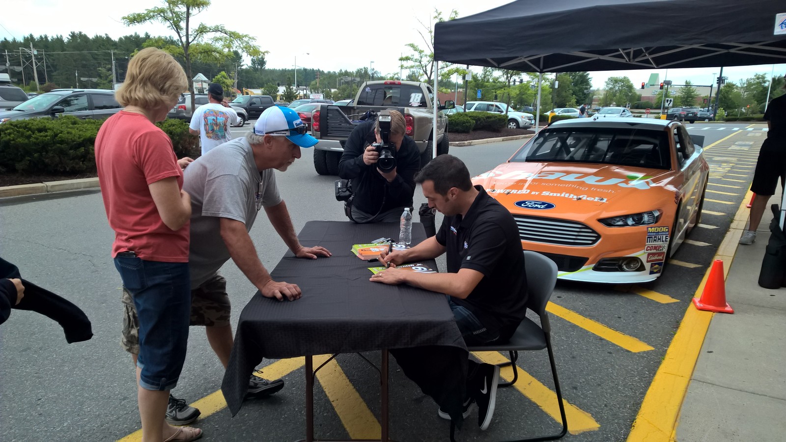 NASCAR Sprint Cup Series driver Sam Hornish Jr. signing for fans at an appearance event at Shaw's of Concord, New Hampshire on July 18th, 2015.