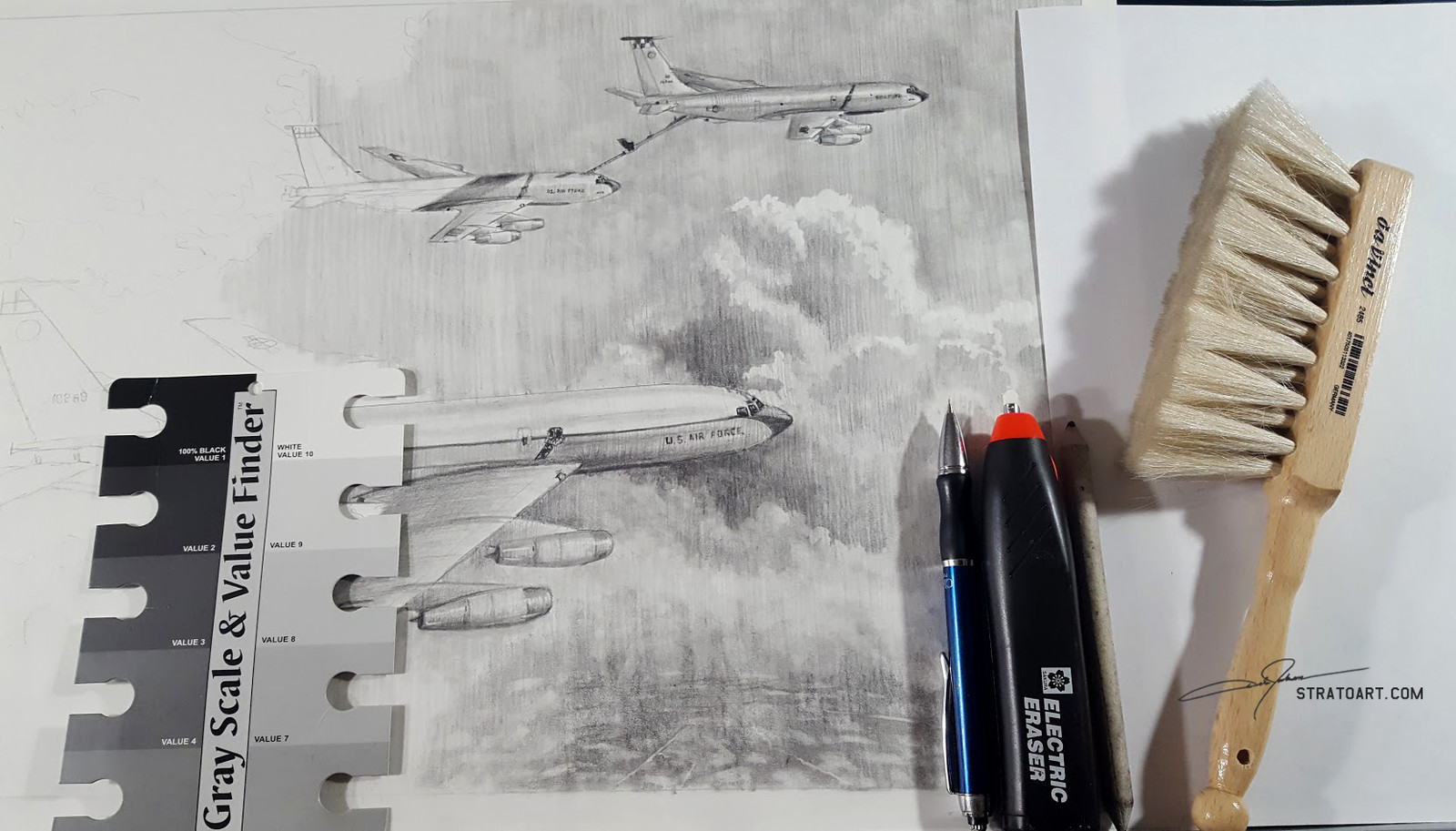 Some of the tools I'm using: Staedtler pencils (not shown); 4B mechanical for finer details; Sakura electric eraser with an eraser nib sharpened with sandpaper to produce fine white detail; drafting brush and gray scale &amp; value finder