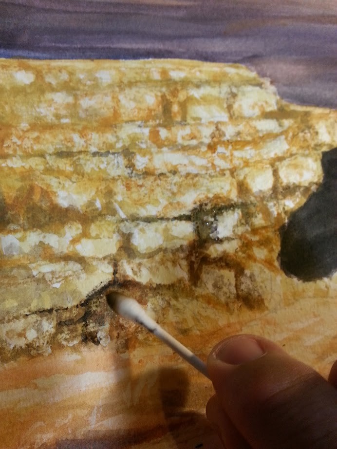 I use a cotton swab to scrumble rocky detail here.