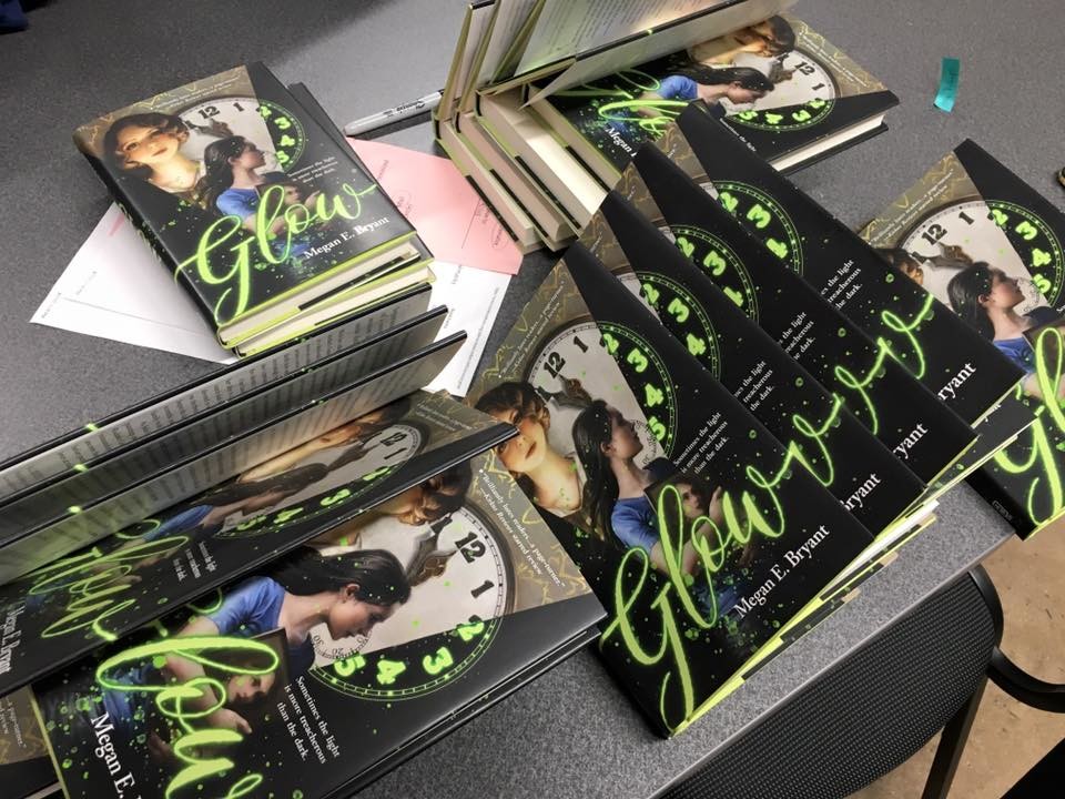Books being signed by the author