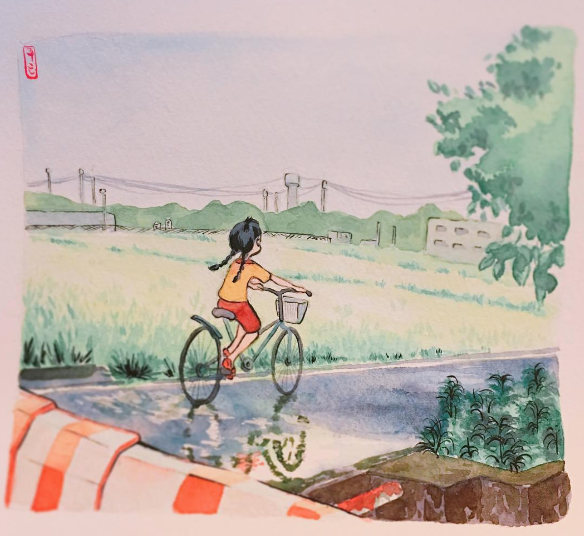 a girl riding a bicycle