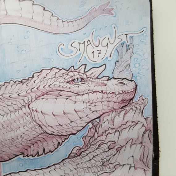 Alligator and komodo dragon inspired.