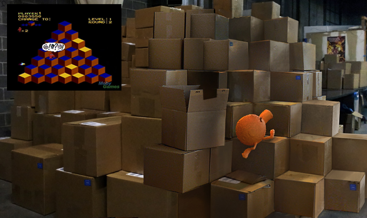 Q*bert having a blast at the post office. The pile of boxes reminds him of his game.