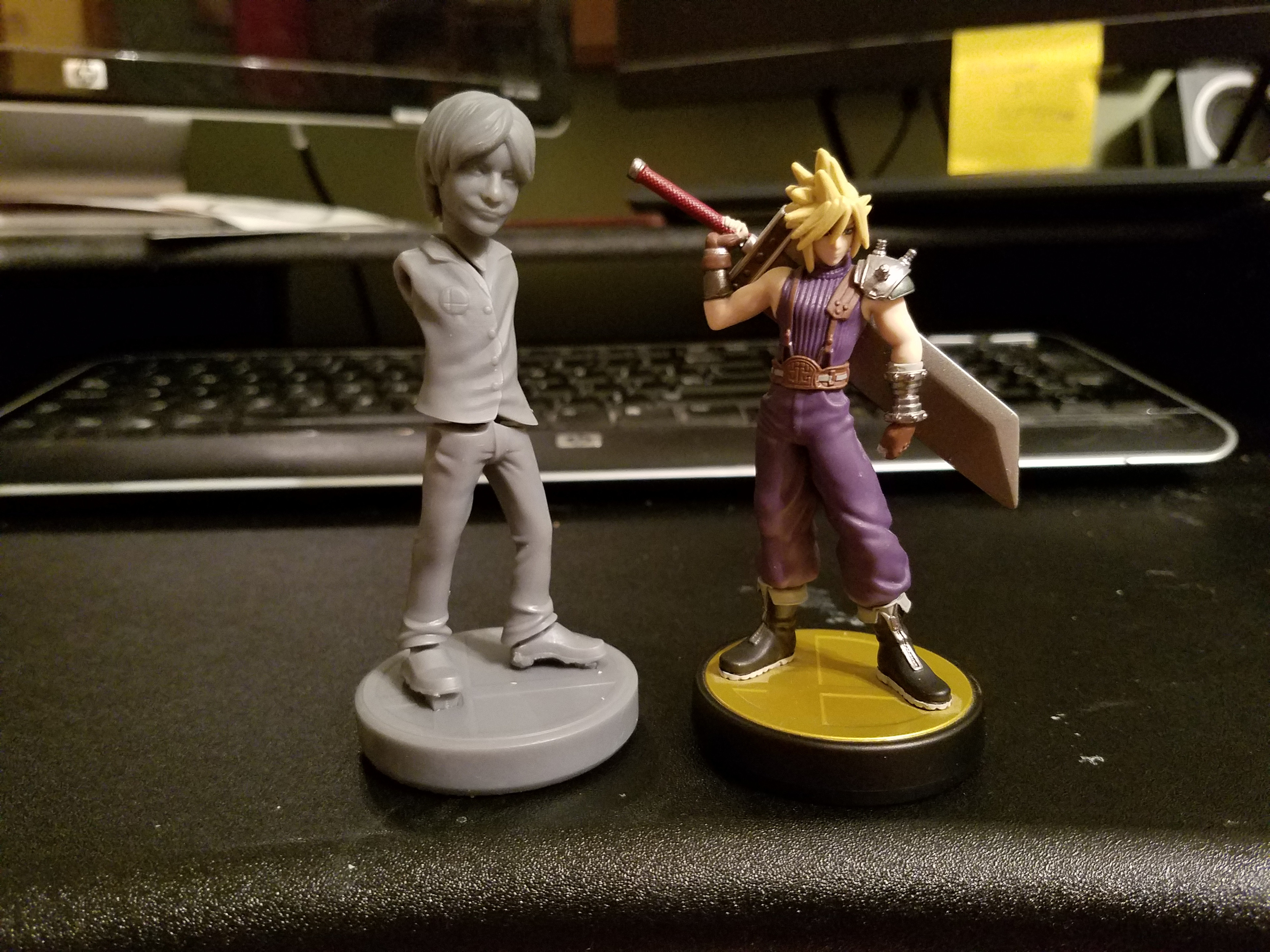 Comparing the size of the print to an existing amiibo. I wanted Sakurai to be a teeny bit taller than Cloud so this came out perfect!