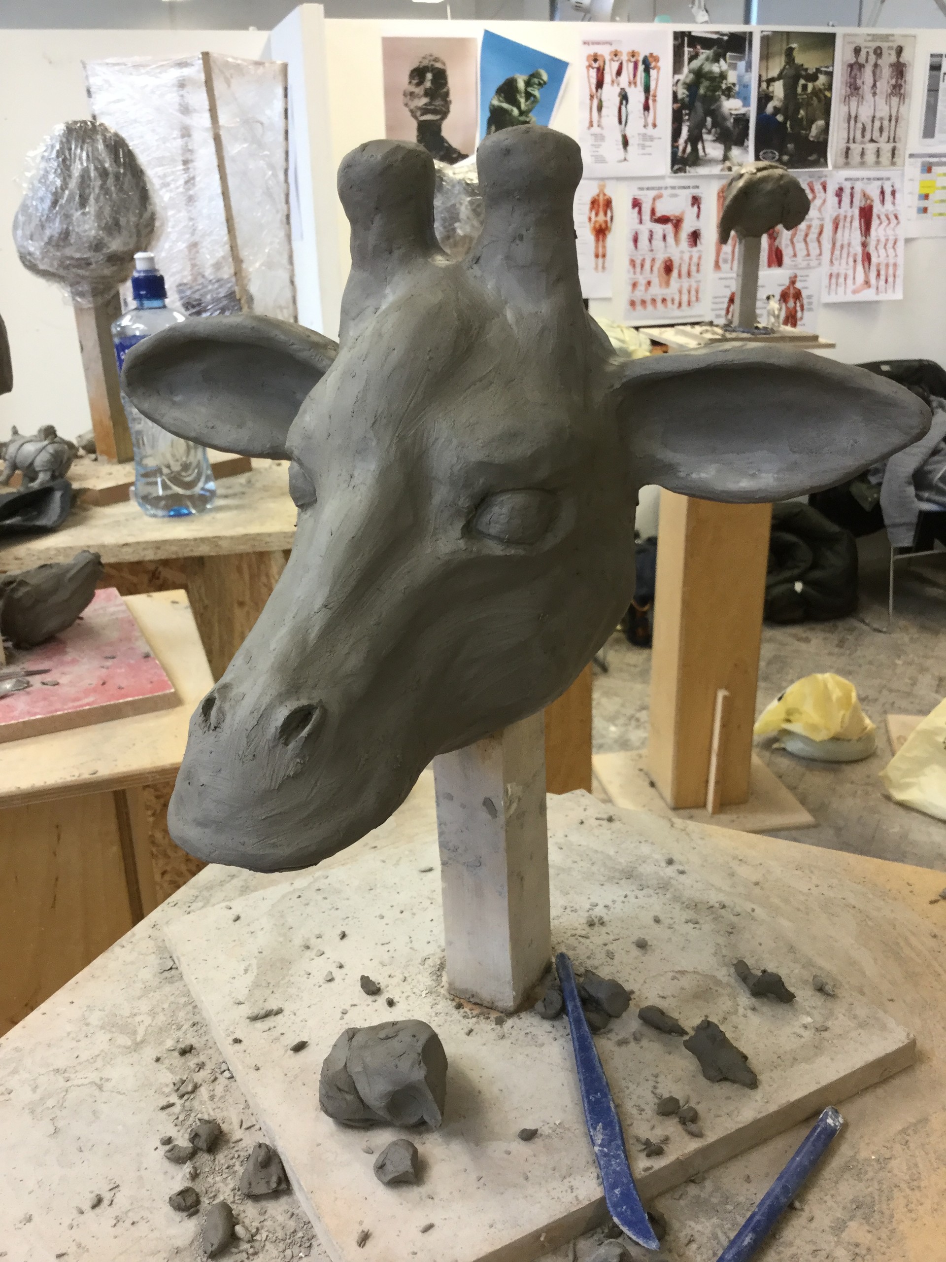 Giraffe clay sculpture sales