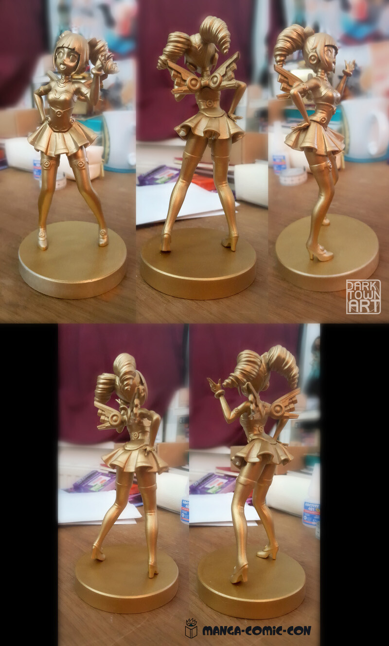 Real life figurine with golden paint job done by me