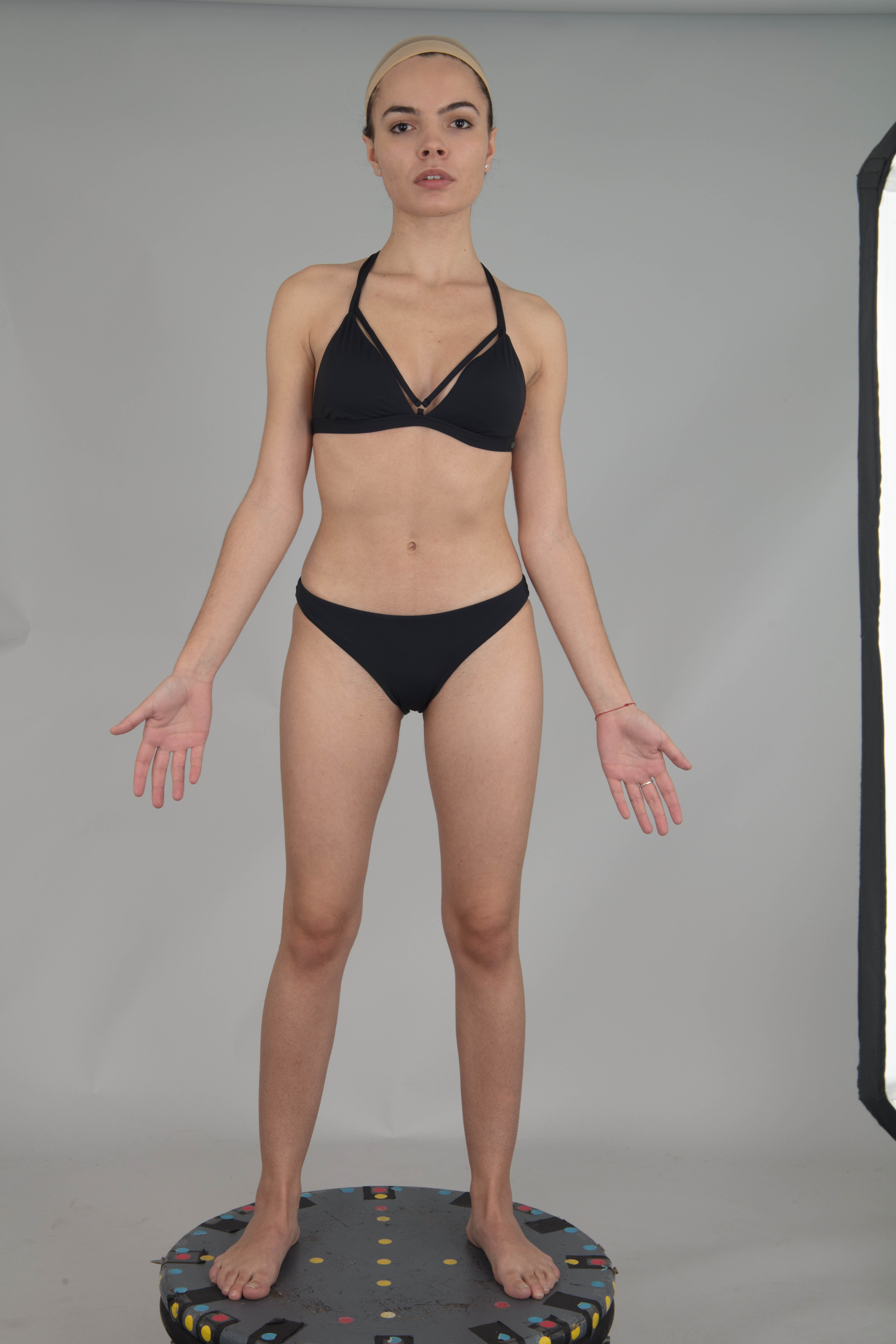 young woman with hands up. in the so-called t-pose used in 3D modeling of  human poses Stock Photo, t pose - thirstymag.com