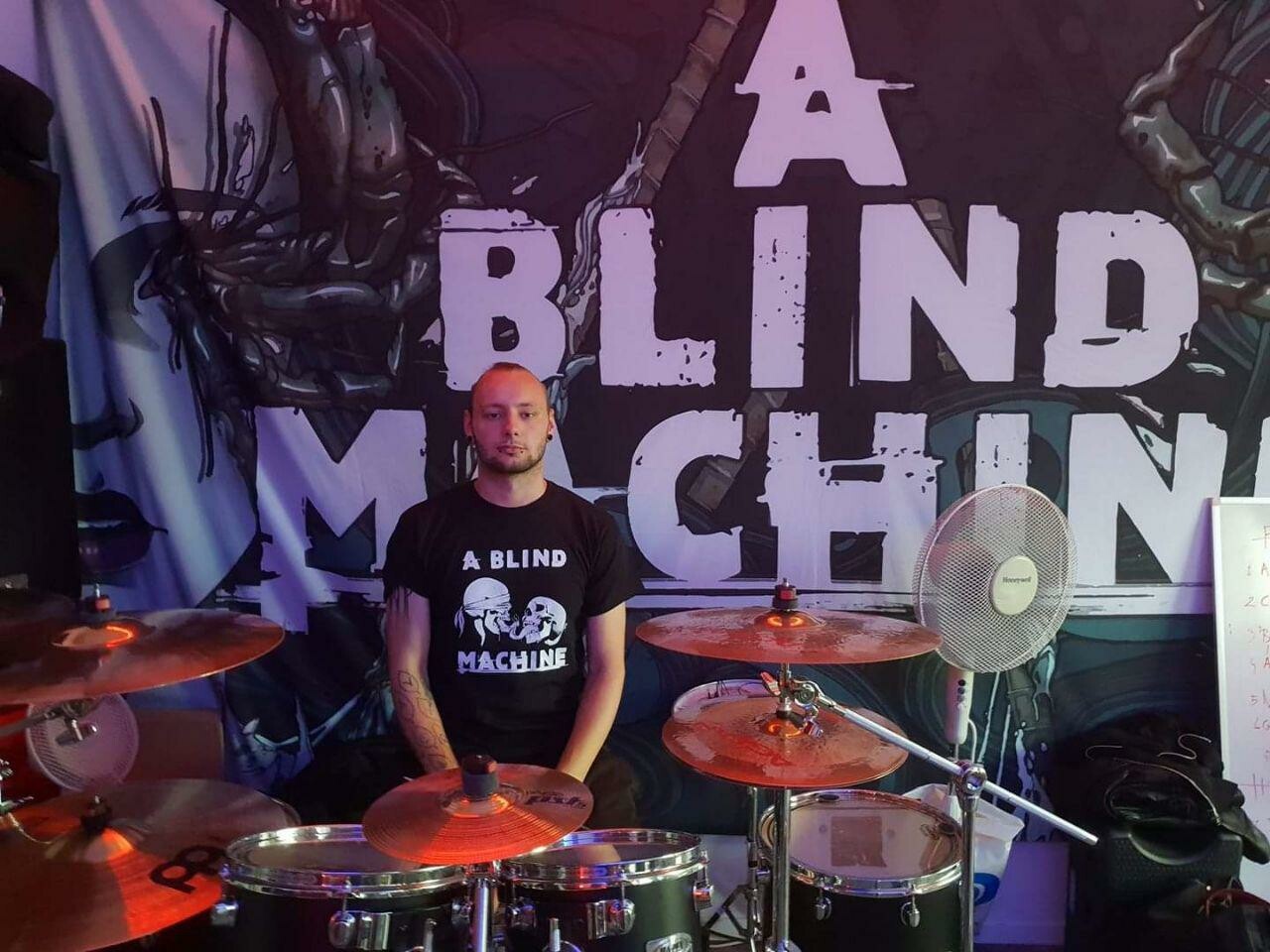 Backdrop, T-shirt and the drummer