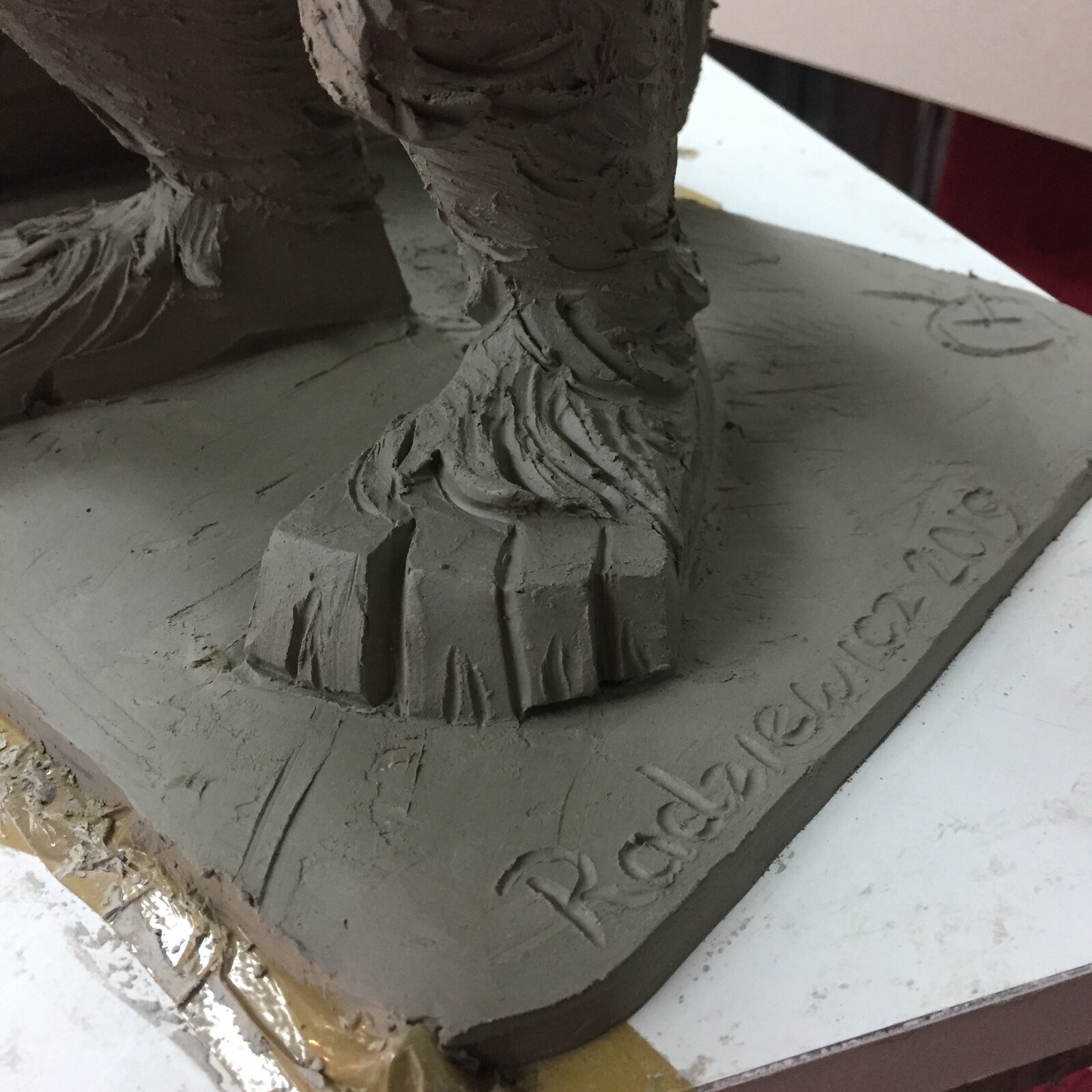 Hewelion wster clay sculpture. It is 53 cm tall. 