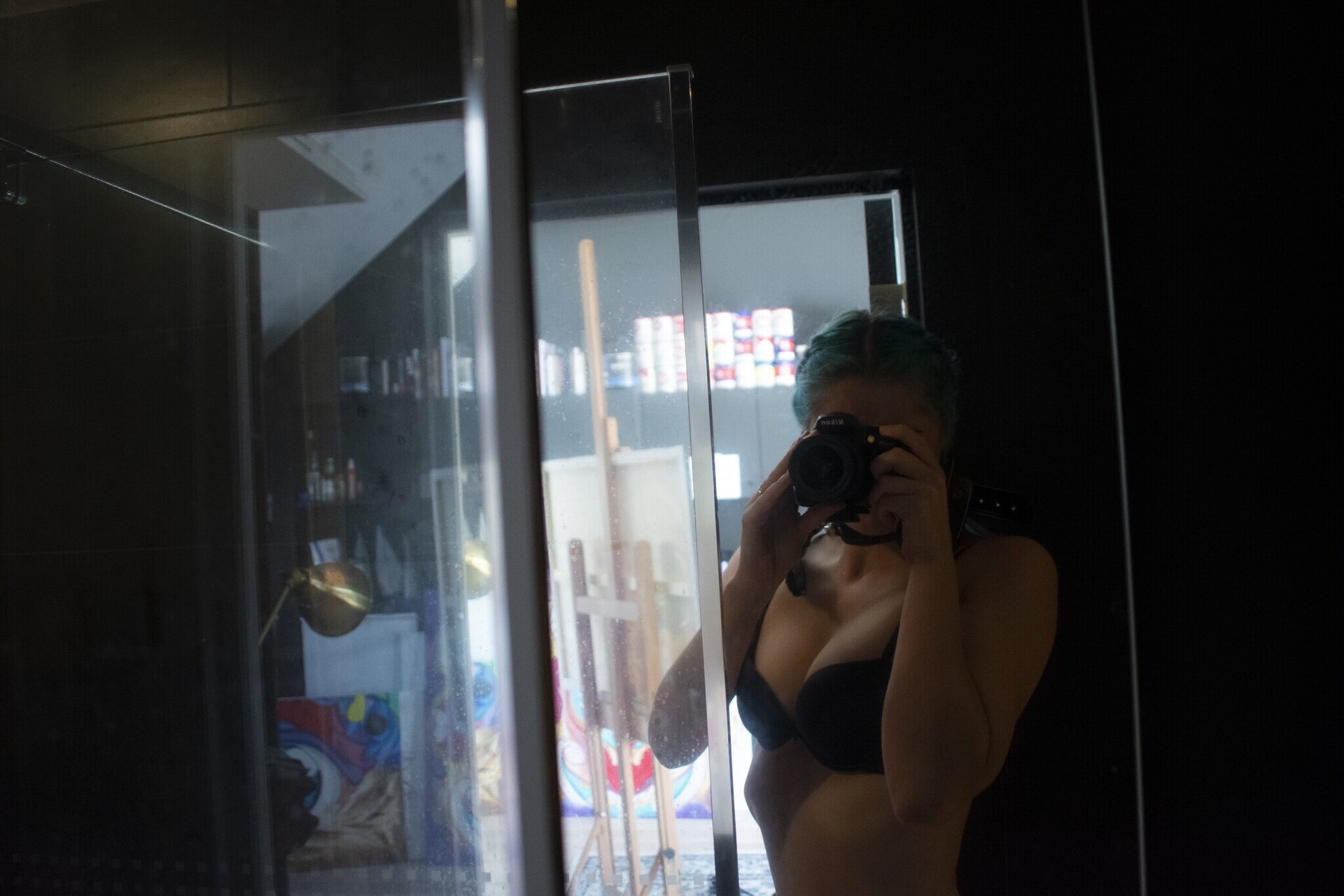 Blue hair lady selfie in the mirror