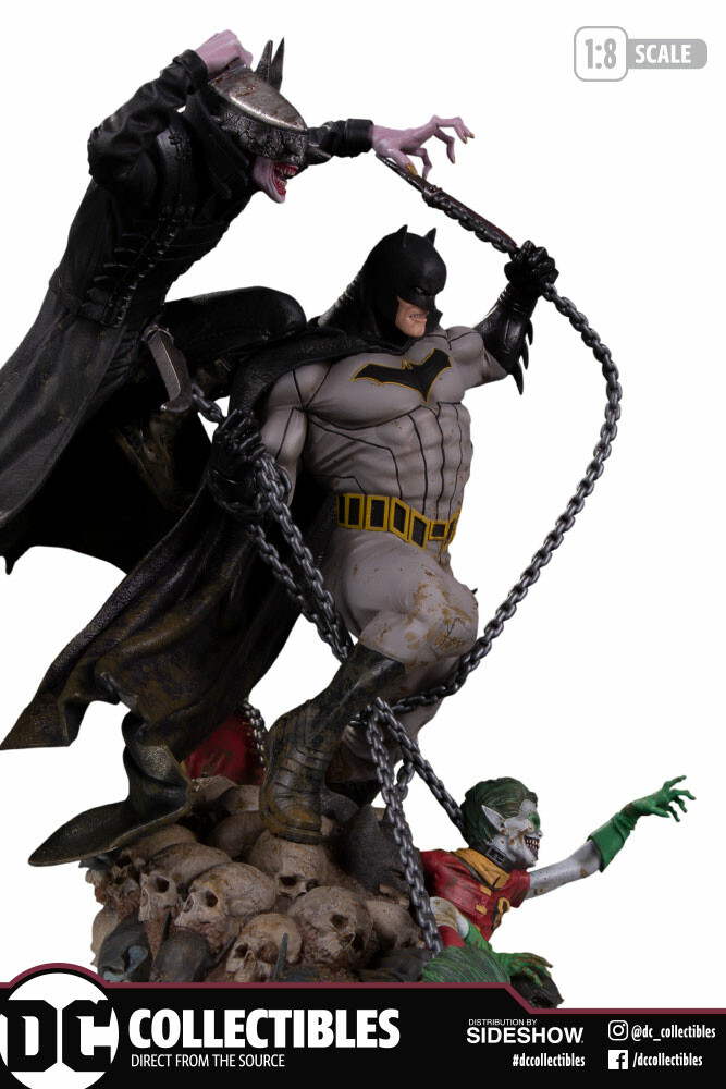 batman vs batman who laughs statue