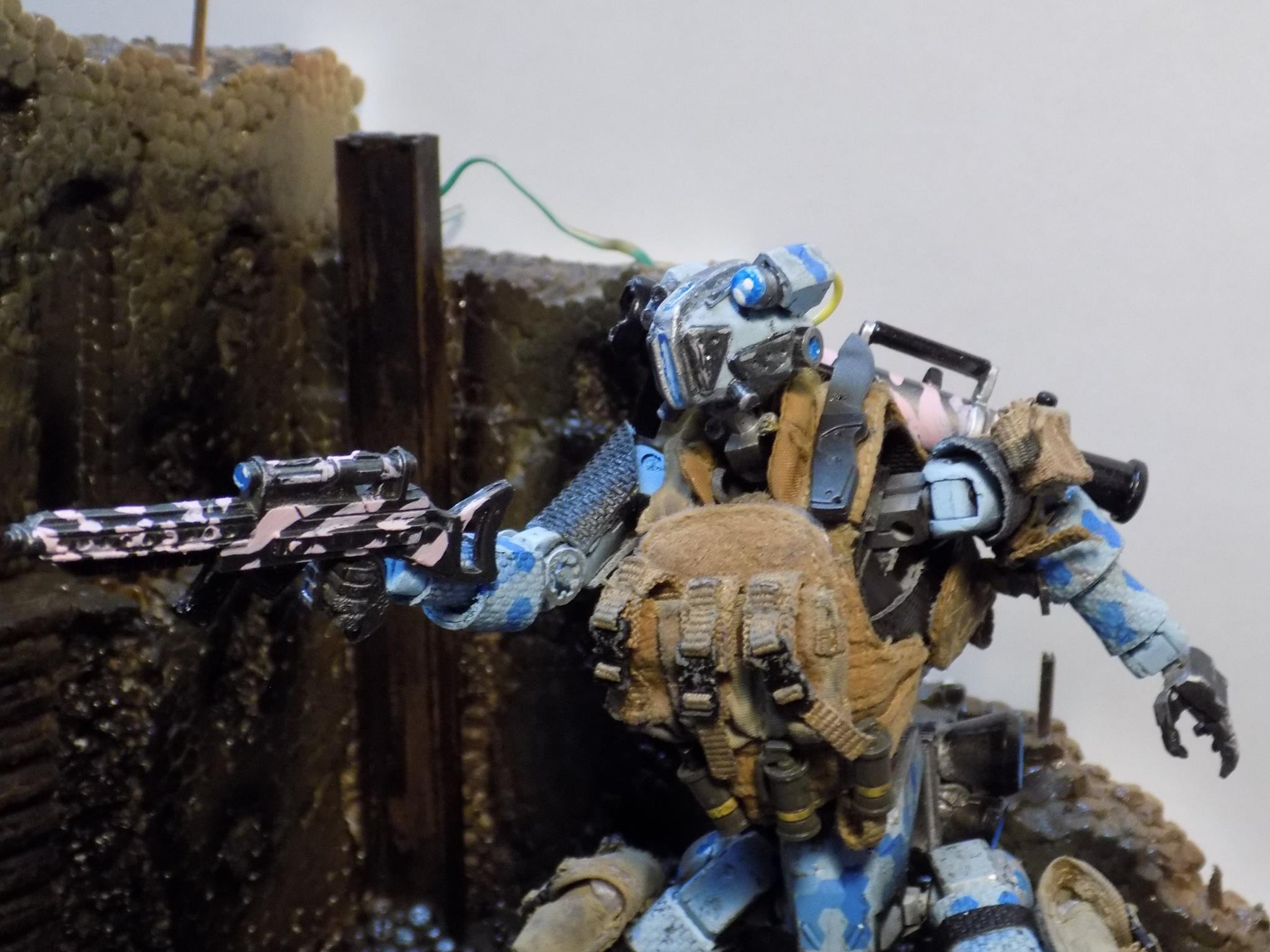 I sculpted the head from clay and styrene. I used a Kotobukiya frame to make the armature. I covered him with scraps from 3A figs and found objects and fabrics then painted everything.
