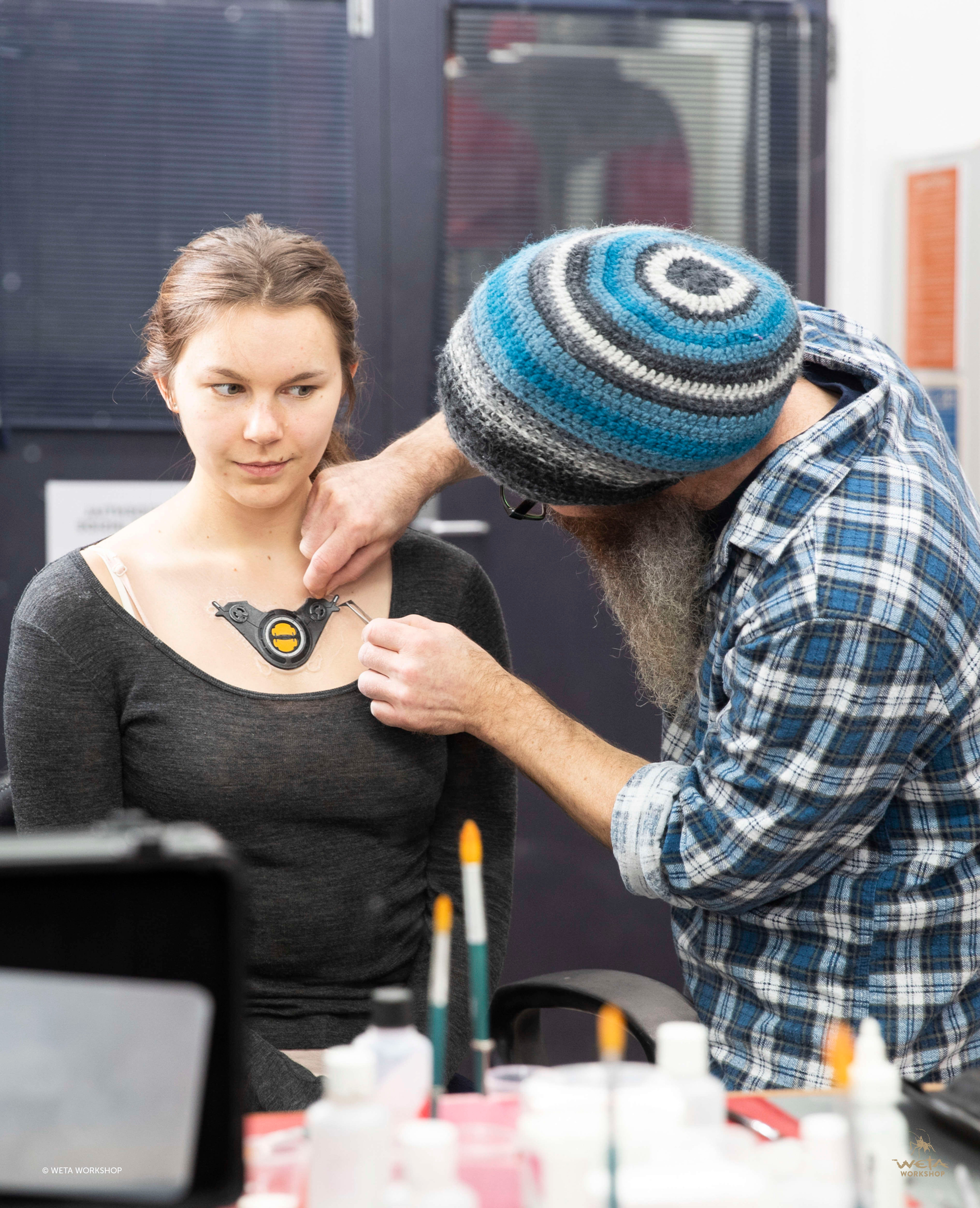 Jason Docherty applying a test prosthetic to my 3D colleague Hannah Dockerty