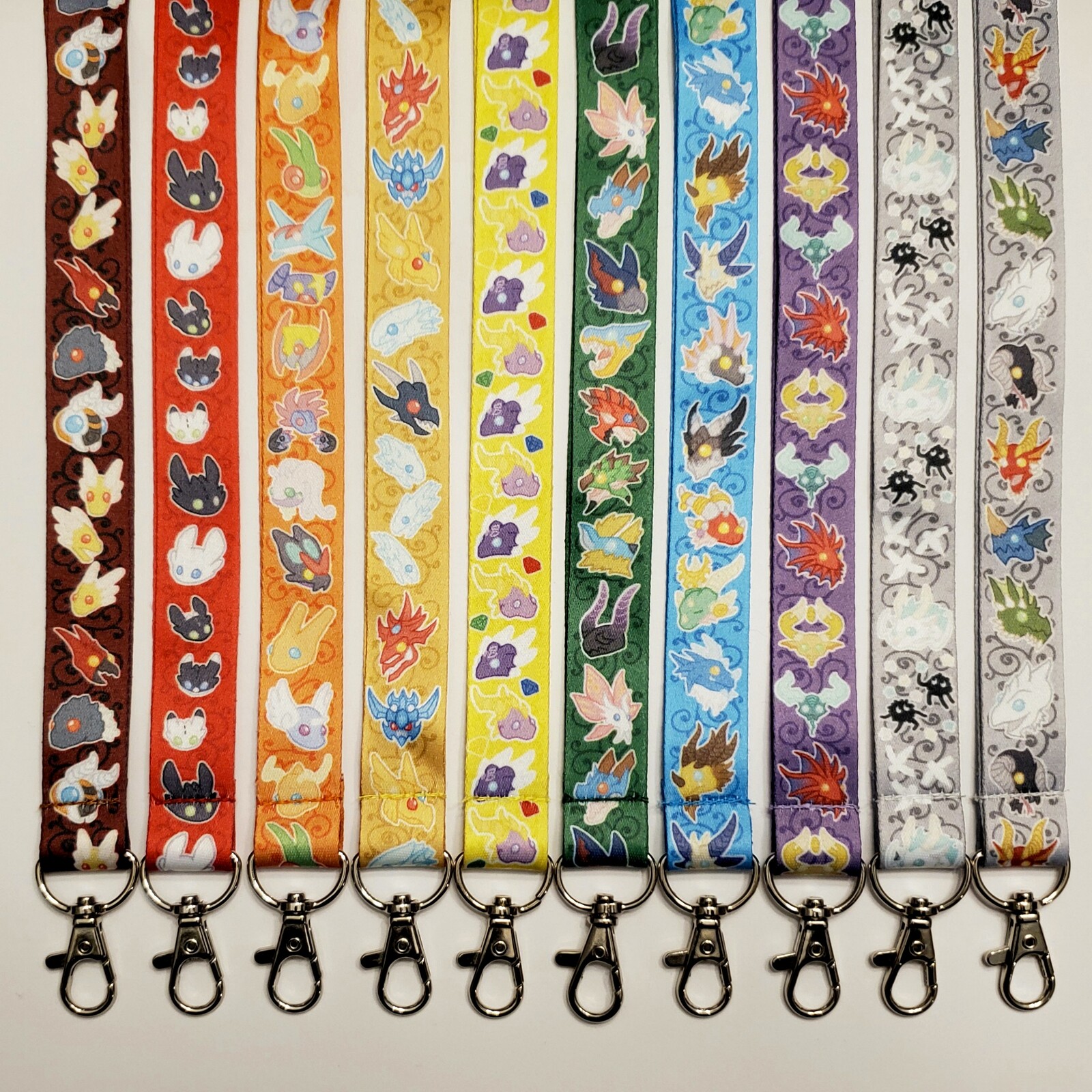 Lanyards with dragons from various series.