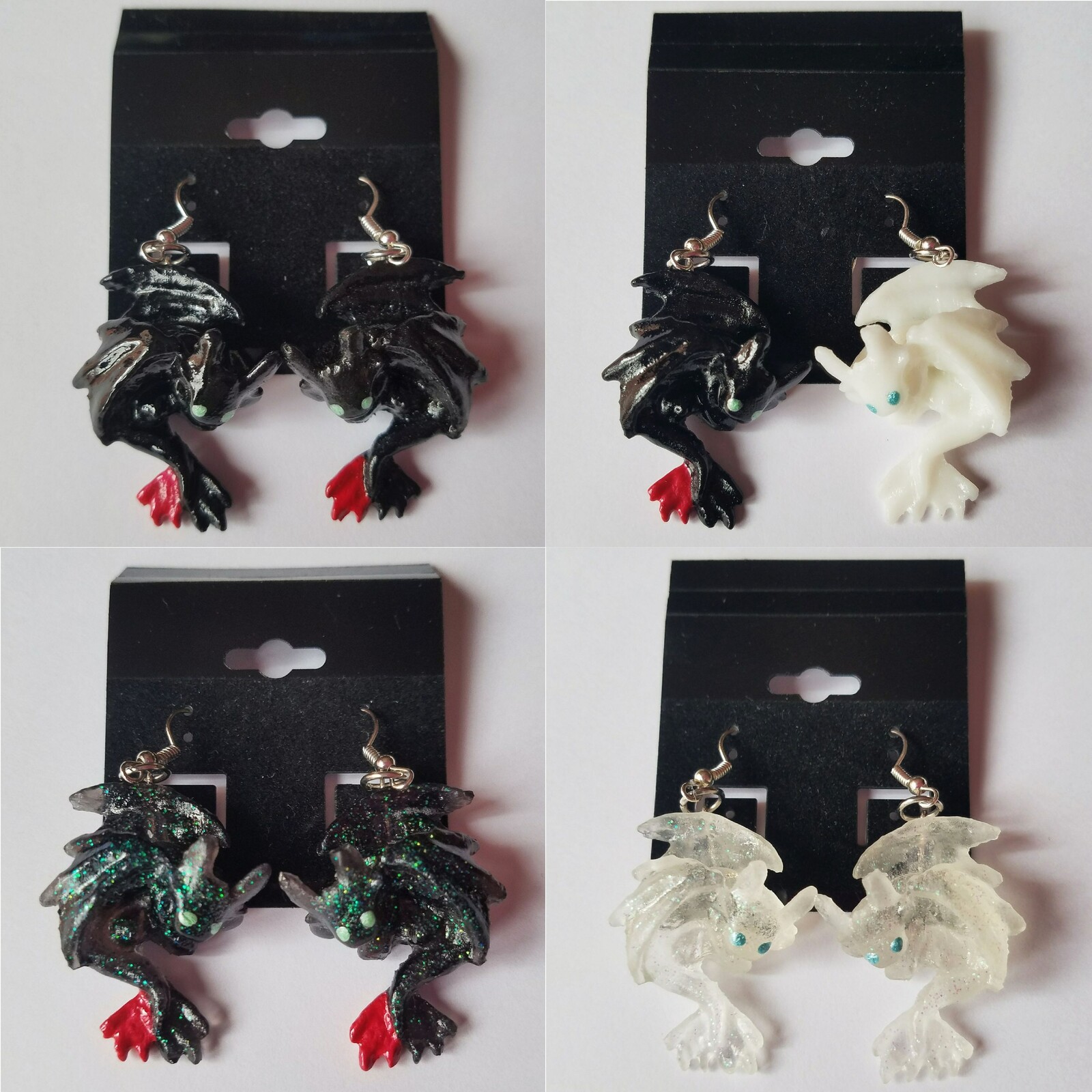 Dwagon earrings of Toothless and Light Fury. Resin cast with hand painted details. Available in different colors. 