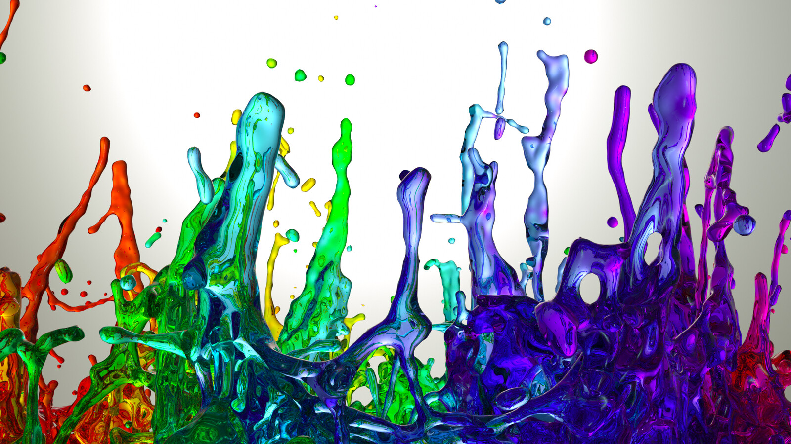Colorful water being bounced on a speaker