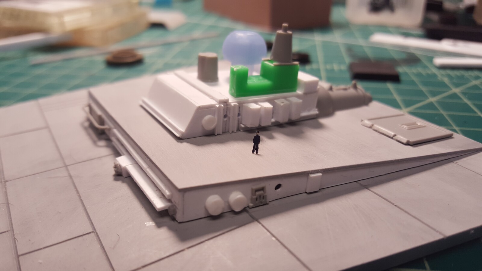 A 1/350 scale man for reference.