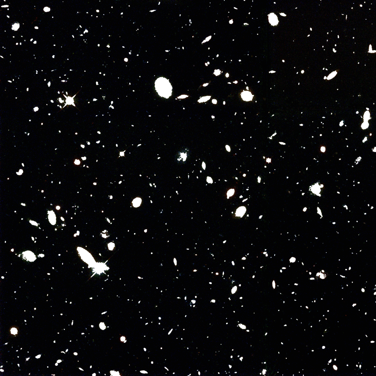 Back and forth showing the Hubble Deep Field raw image and the source removal. 