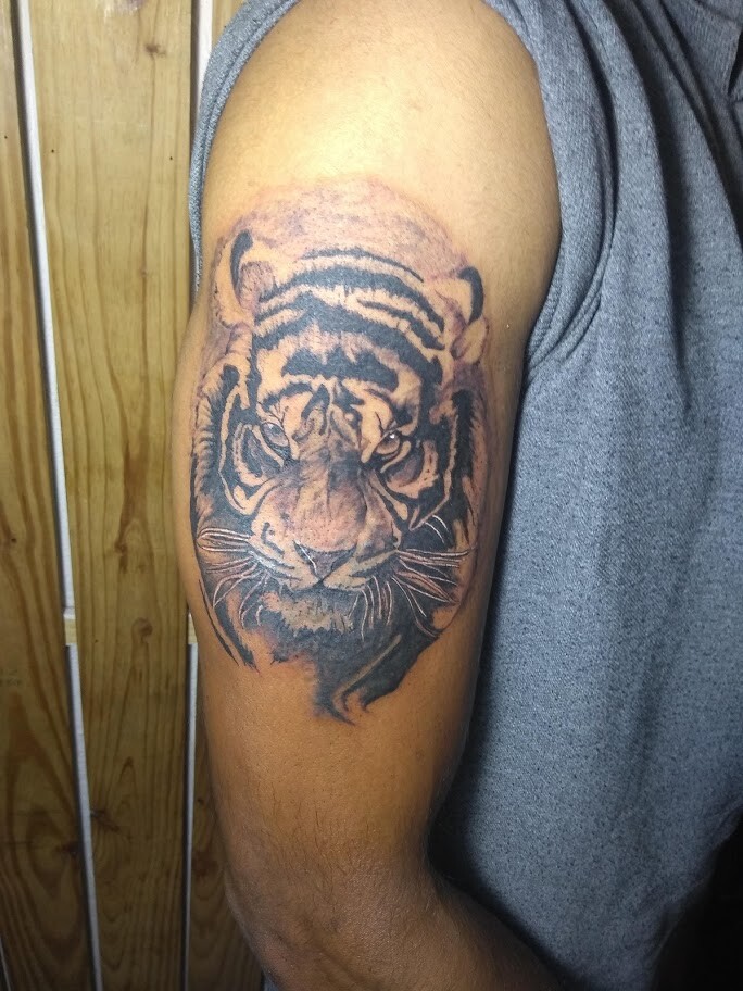 Pavan Kumar - Tiger Face Tattoo