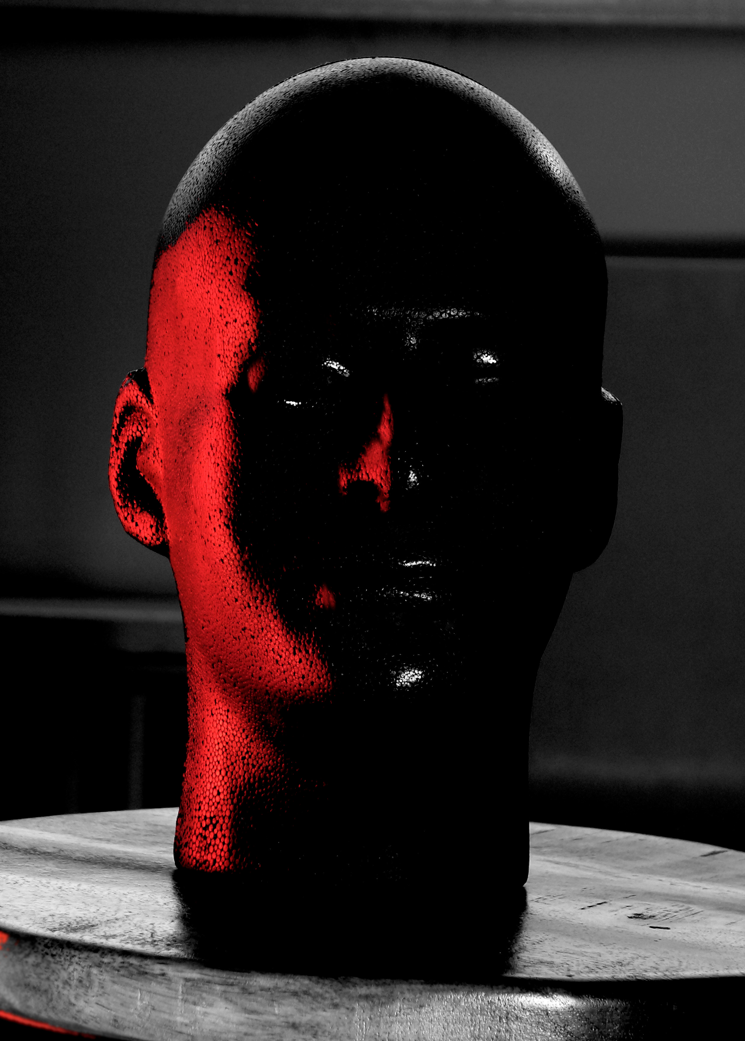 Photograph of a the manikin head demonstrating the  placement and properties of  of the highlight and the reflected light. Created by Vince Mancuso