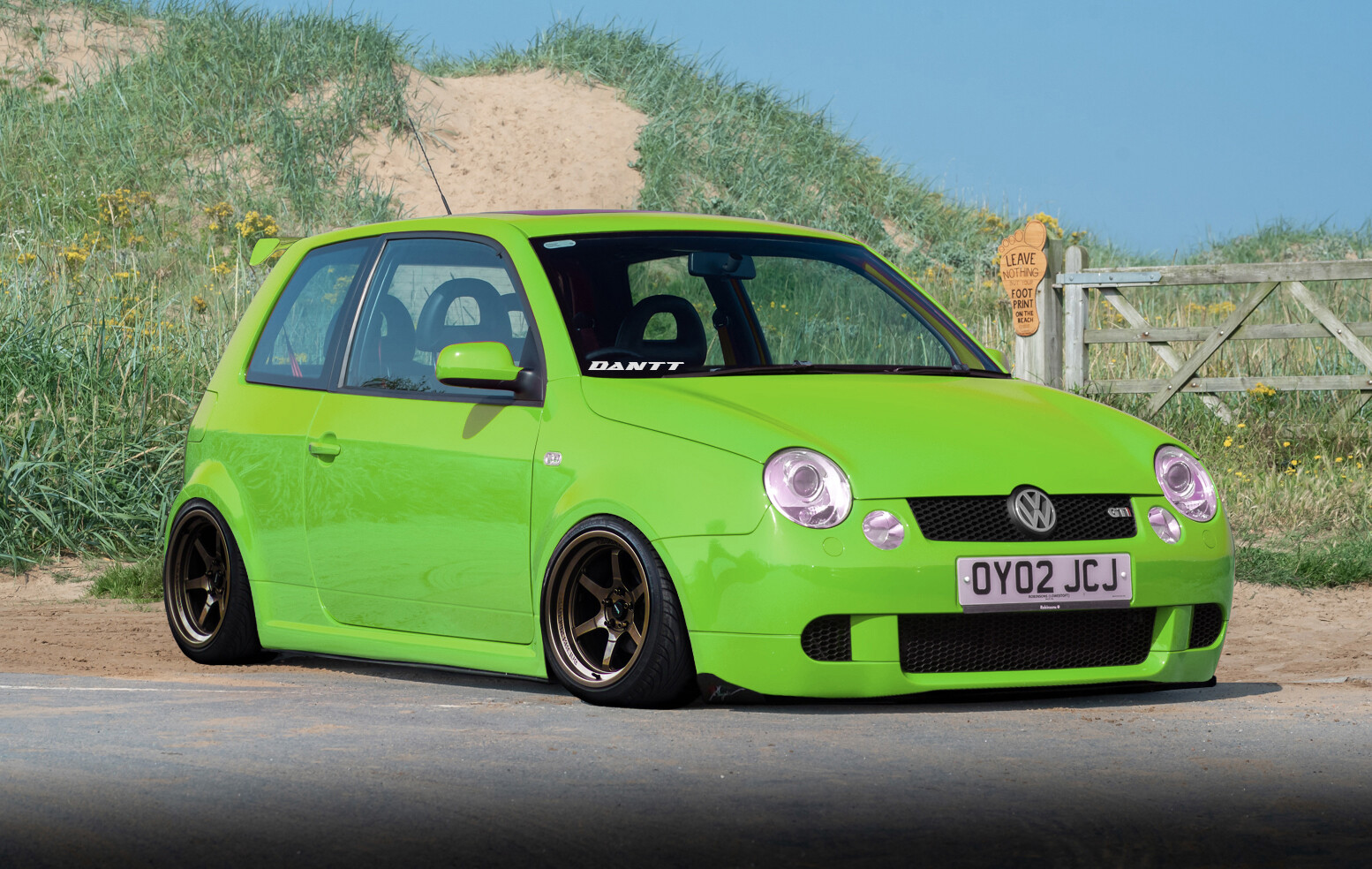 Modified green volkswagen lupo with dakar off-road-inspired design