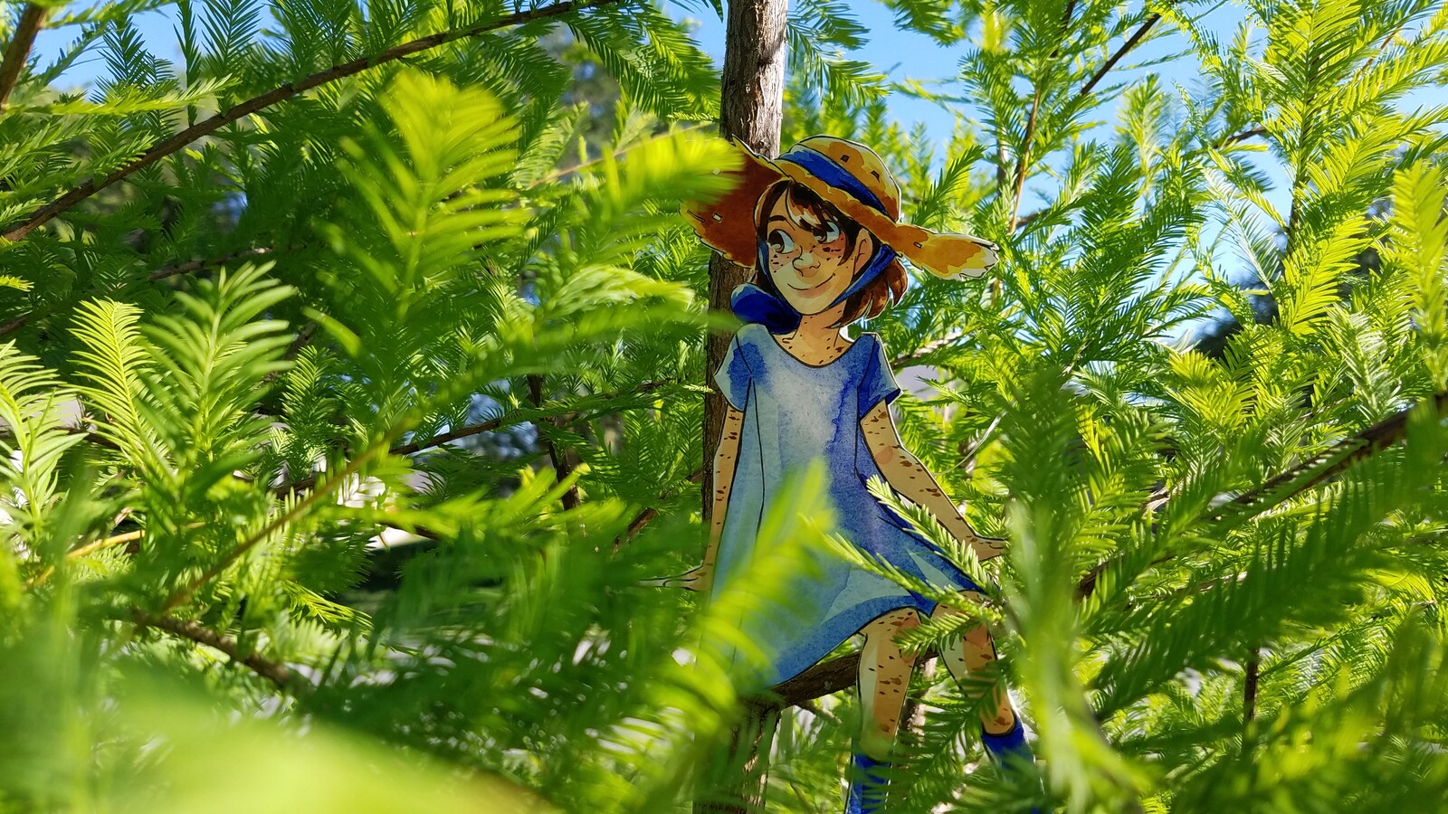 Cut paper character posed in a real world environment create an augmented reality perfect for suburban fantasy.