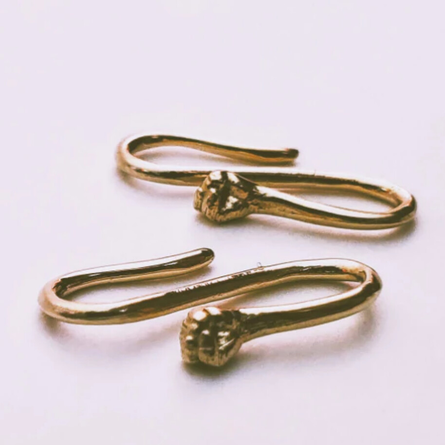 PTP Fist earring cast in gold (my favorite)