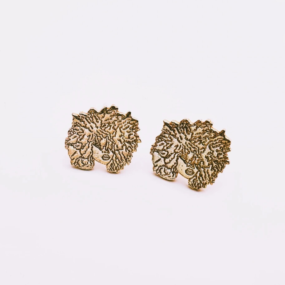 Texture studs cast in gold based on the Peaceimages logo 