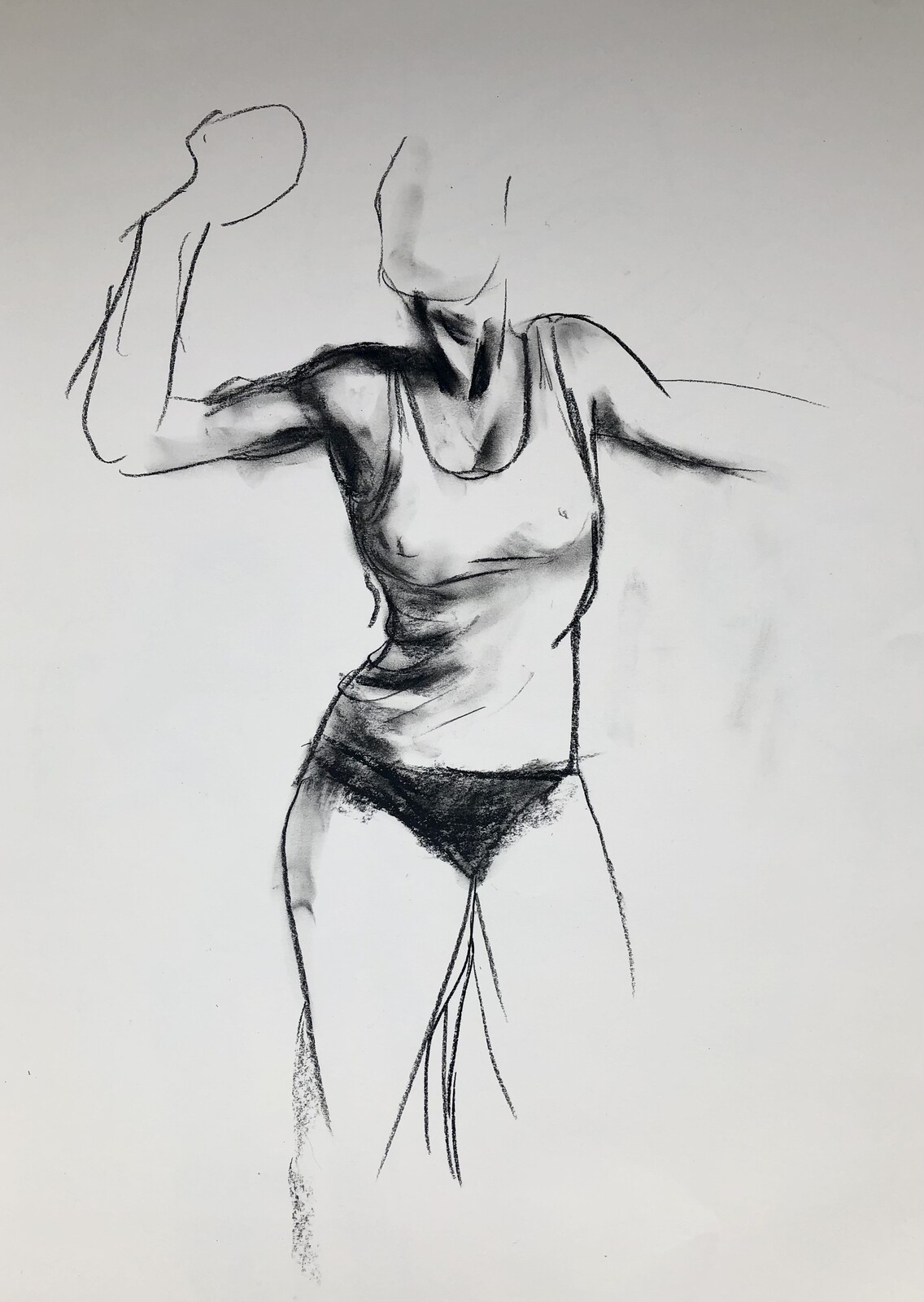 Expressive figures. Charcoal on white paper.