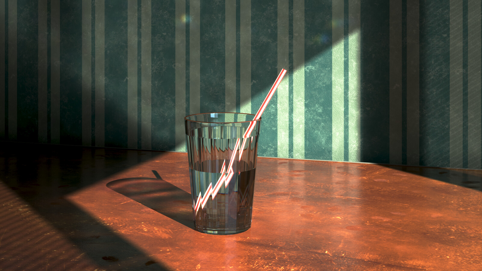 Glass with a straw on the table