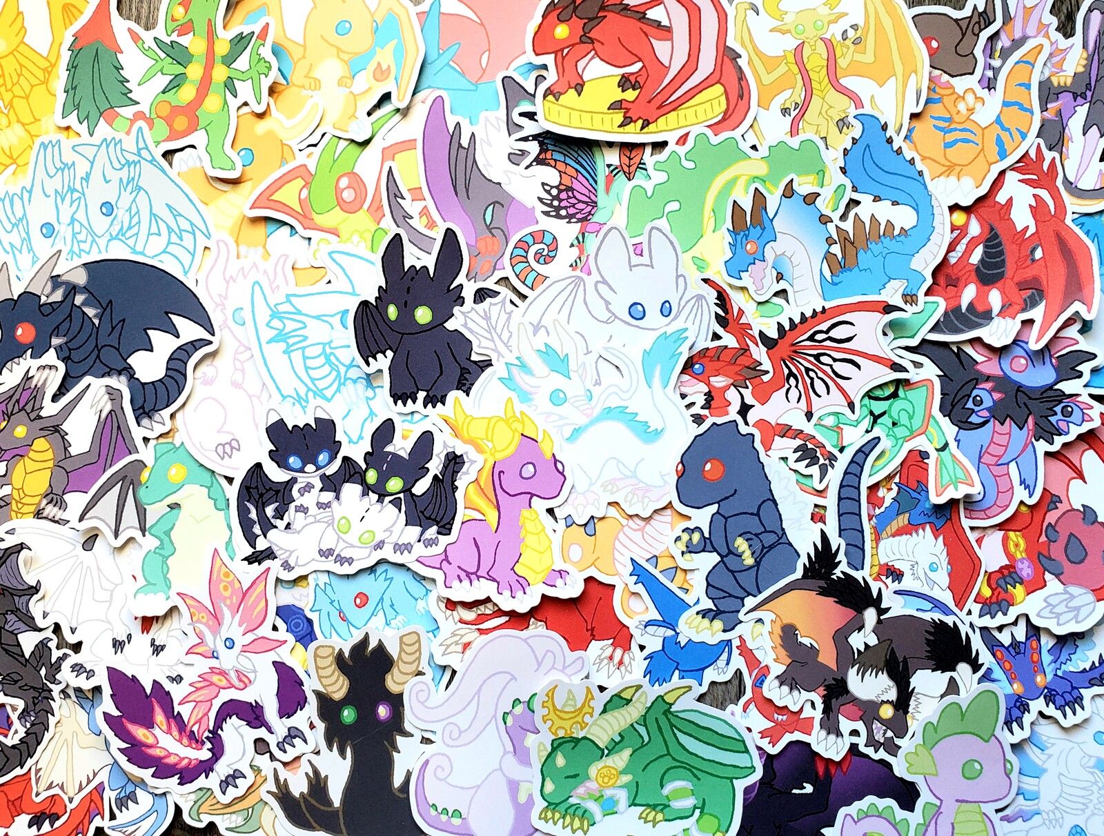 Vinyl stickers of a variety of dragons from different series. 128 total designs available.