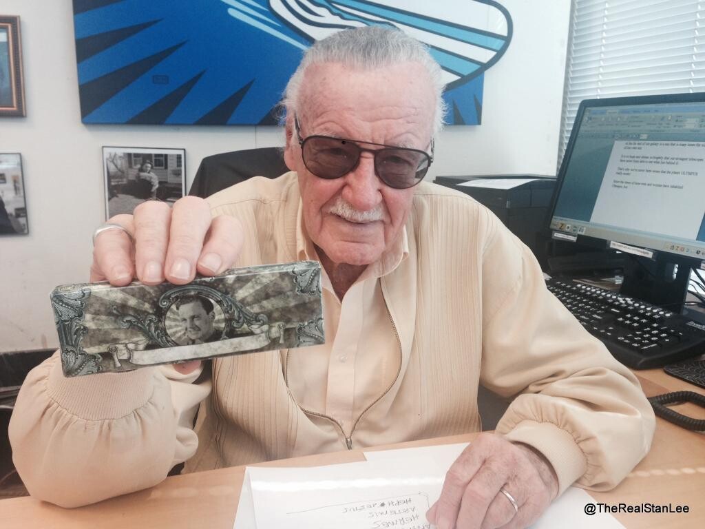 Stan Lee showing off his First exclusive bar