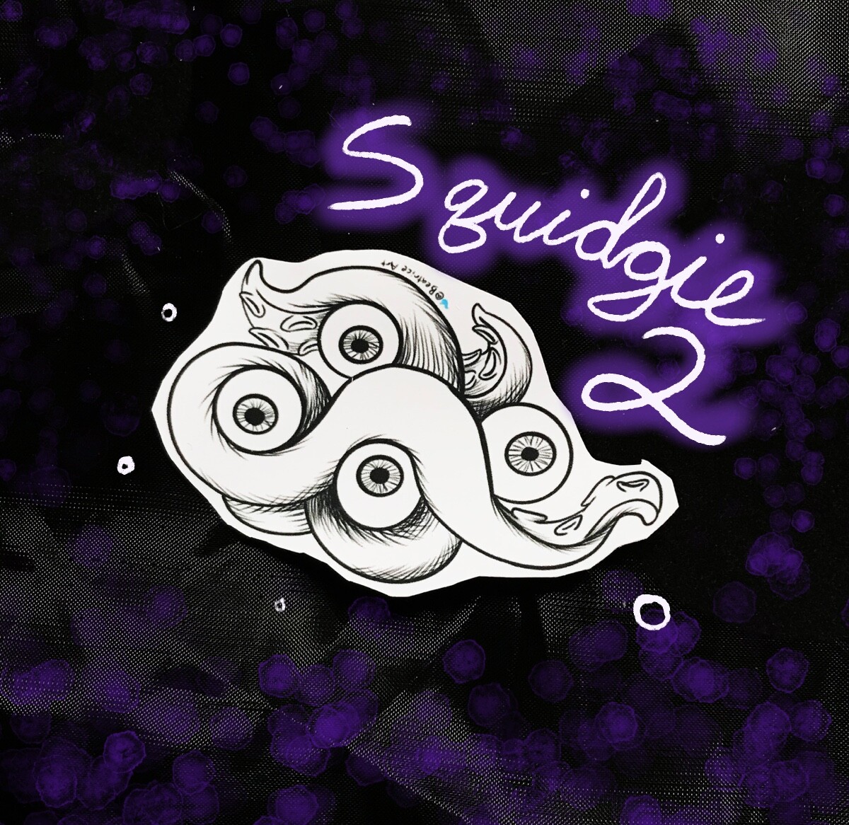 Squidgie 2, featuring 4 eyeballs.