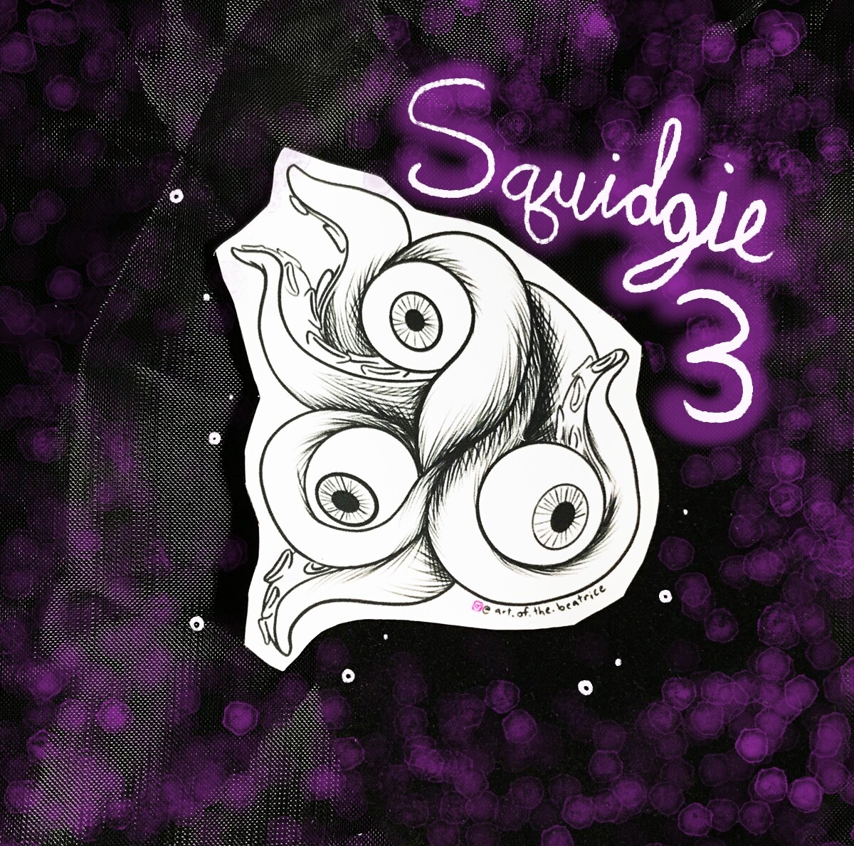 Squidgie 3, featuring 3 eyeballs.