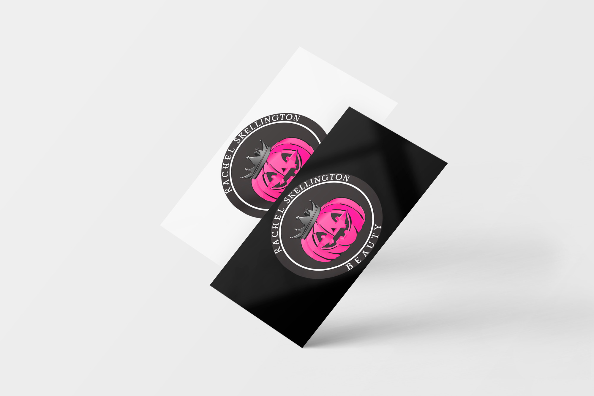 A business card mockup of the above logo made using a free template.