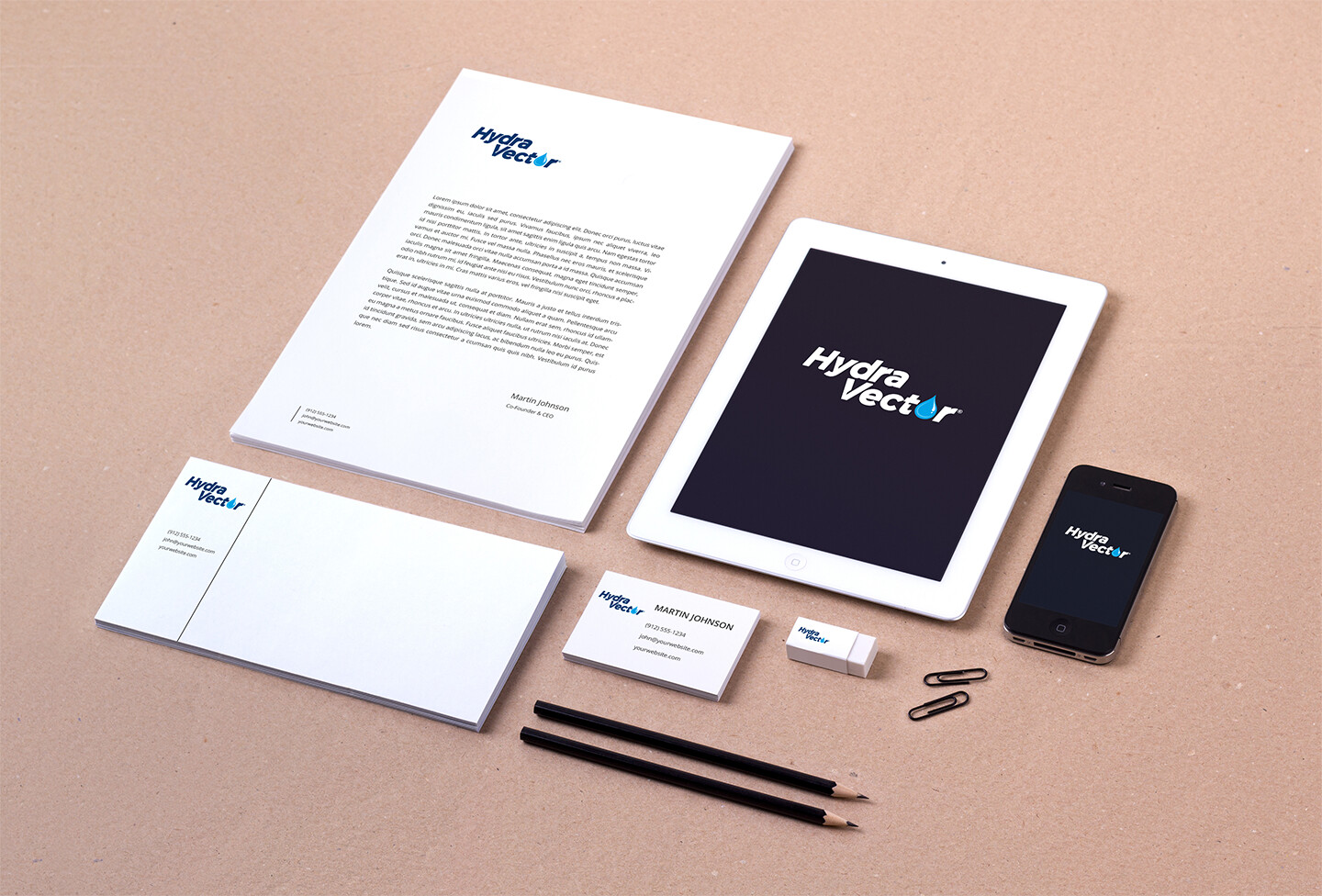 HydraVector logo mock-up on various print items