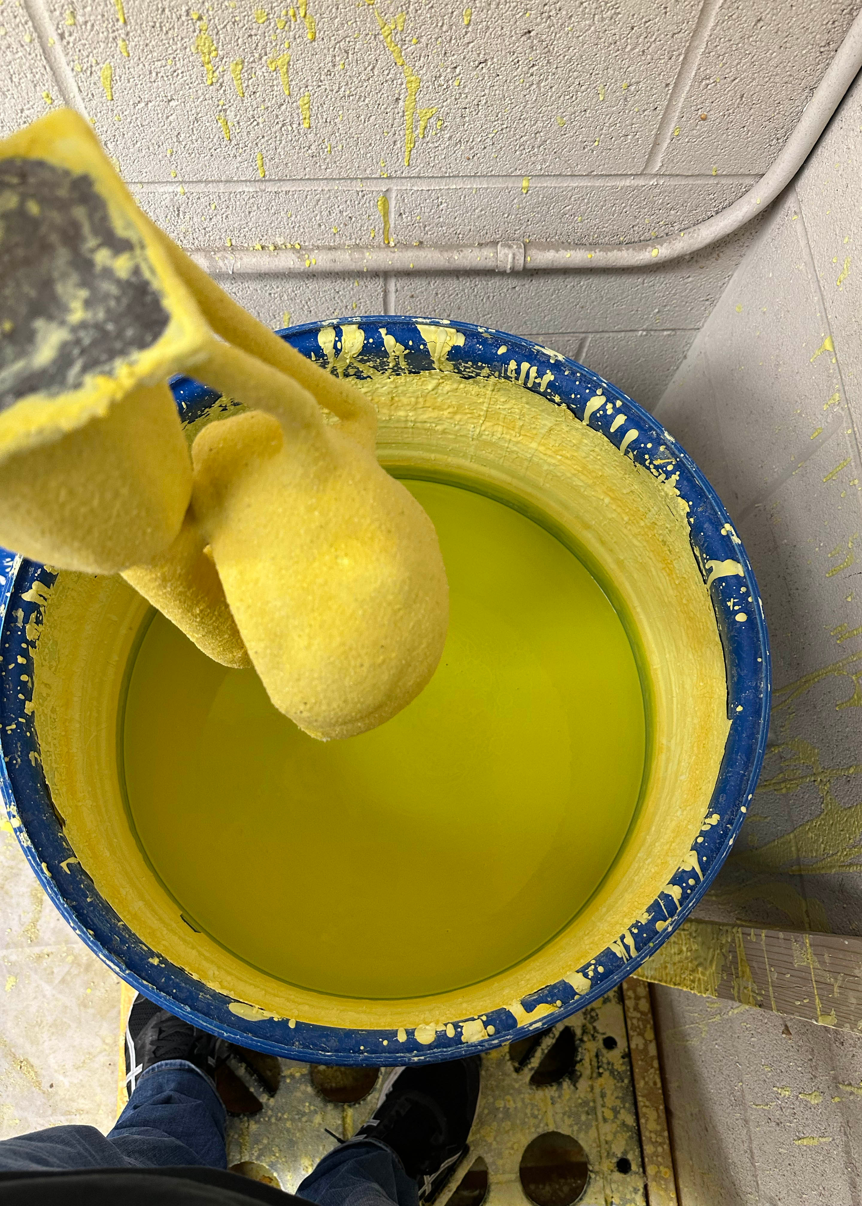 The wax is dipped into the vat of slurry
