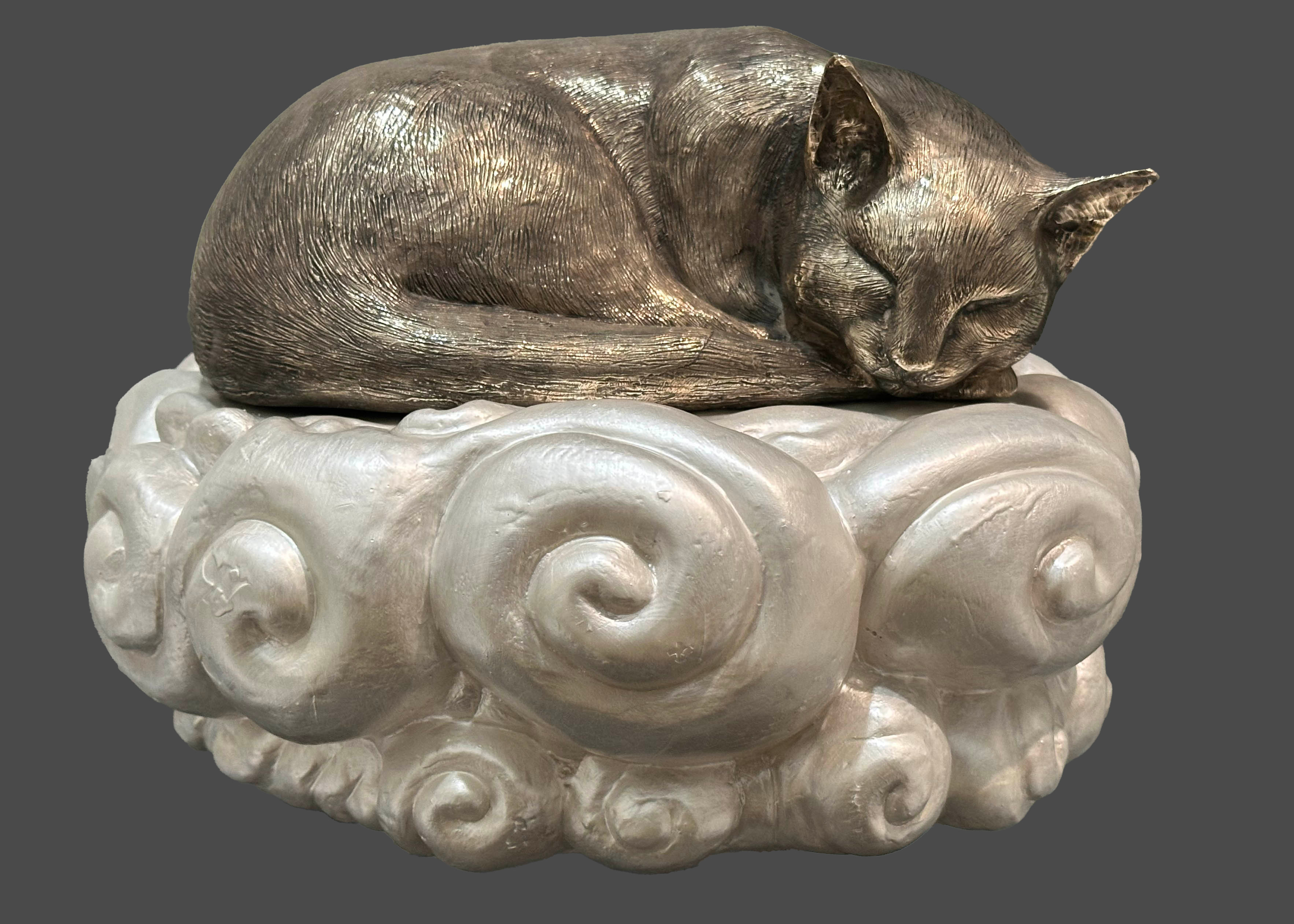 I painted the base with a metallic pearl paint and then coated it with a glossy clear topcoat. For the bronze, I wet-sanded, polished with a rotary tool, and then buffed it with a cloth.