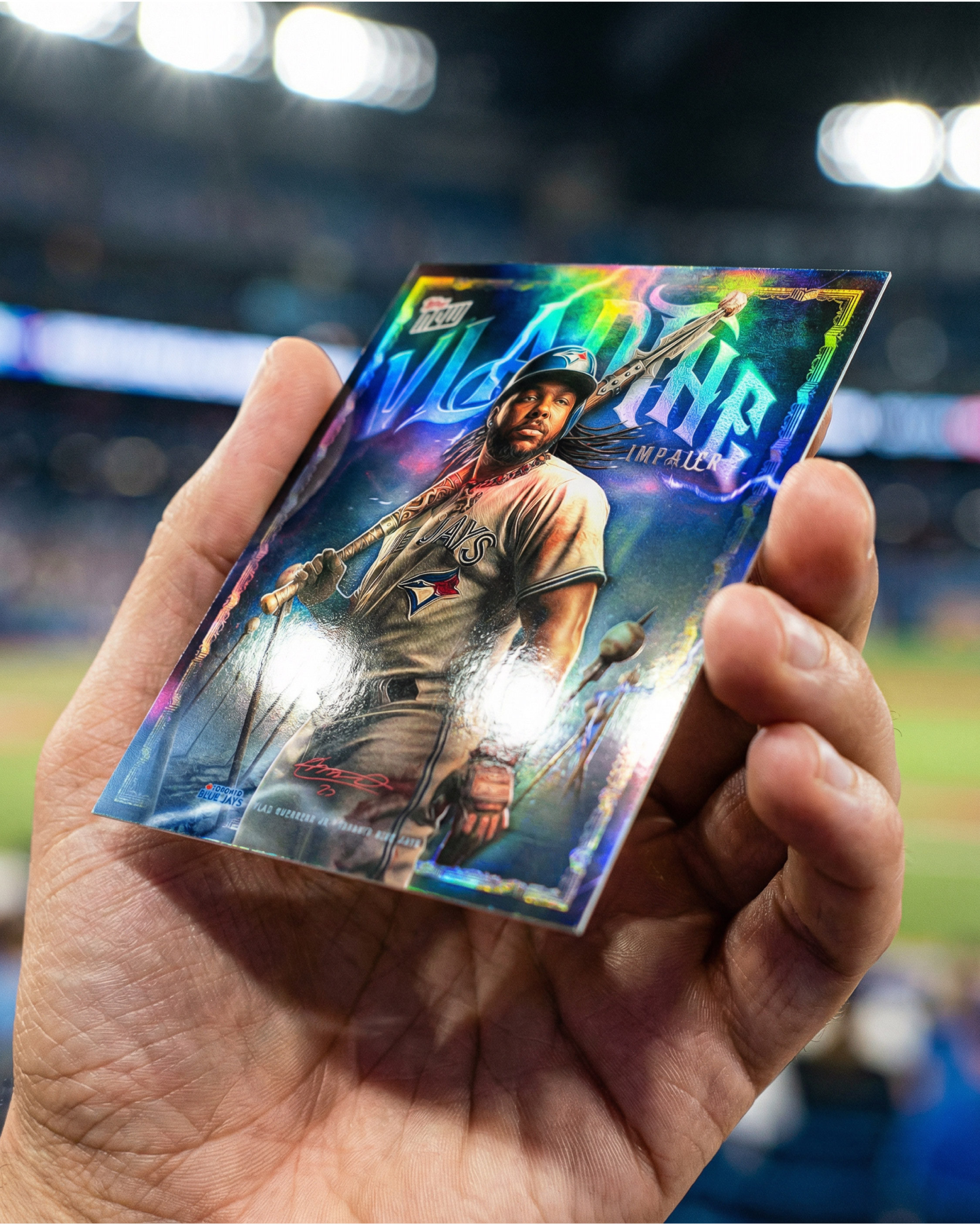 In-hand holographic mockup highlighting foil effects and print realism
