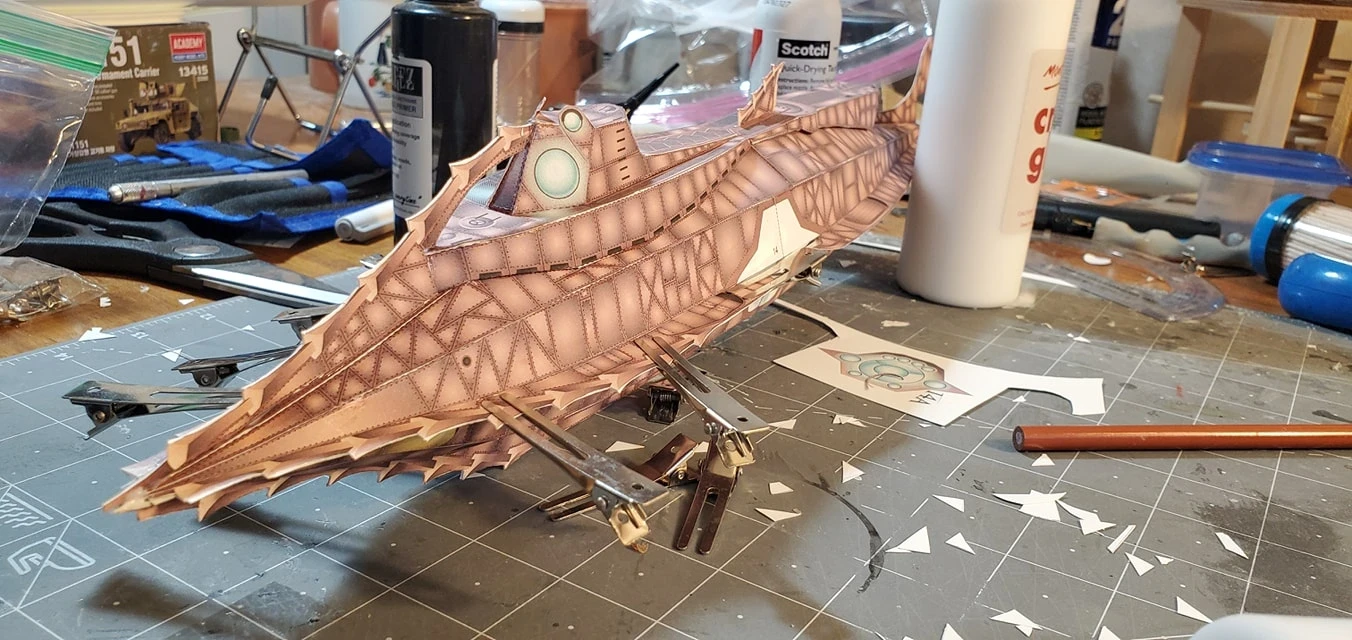 20,0000 Leagues Under the Sea - Nautilus Paper Card Model. Build by Dale Jackson. Designed by Kevin Kittle. Free Model at: https://www.disneyexperience.com/activities/models/20klus_model.php?