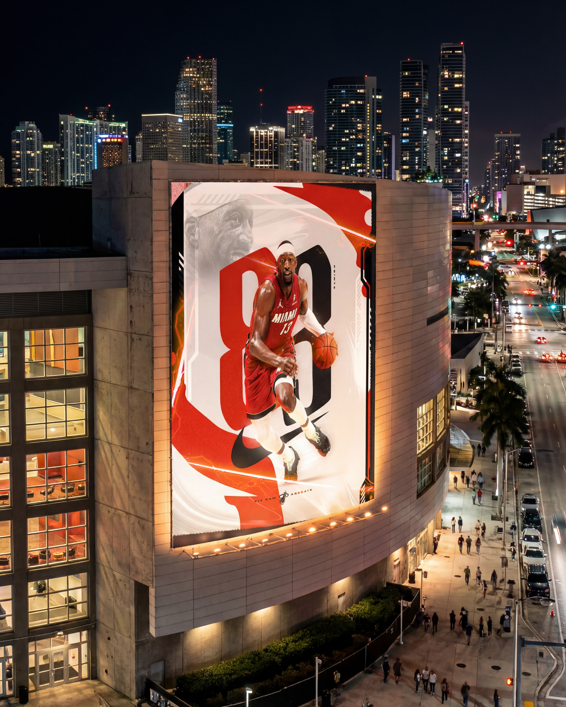 Exterior billboard on the arena facade against the Miami night skyline. Red and white against the city lights. A performance this historic deserves to be seen from the street