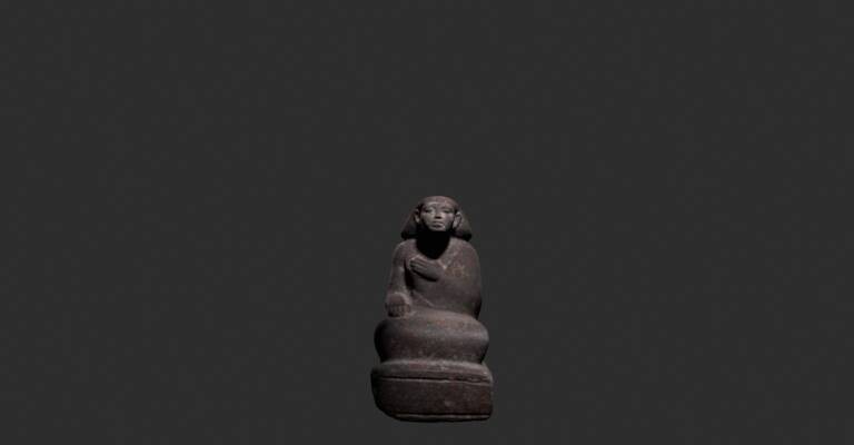 STATUE OF A SEATED MAN