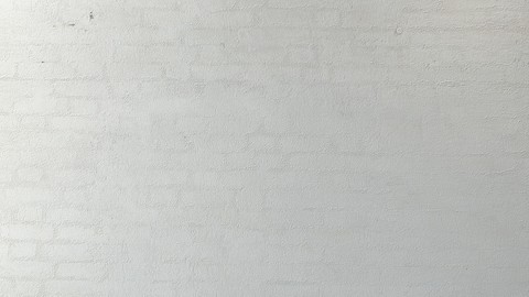 Old plastered brick wall