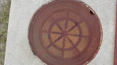 Rusty ol Manhole Cover