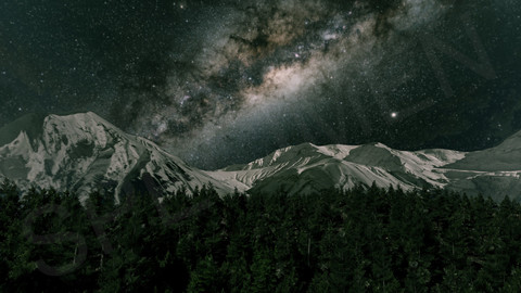 Galaxy Rising Over Mountains