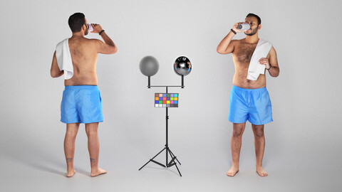 Shirtless young man with towel drinking water 304